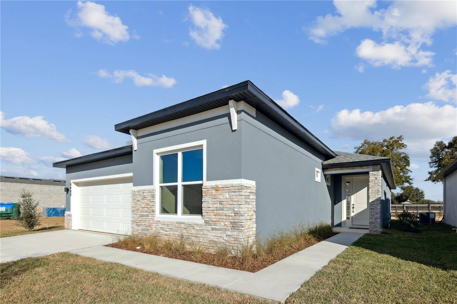 Photos are of same model with similiar finishes - 82 SPRINGWOOD DR, PALM COAST