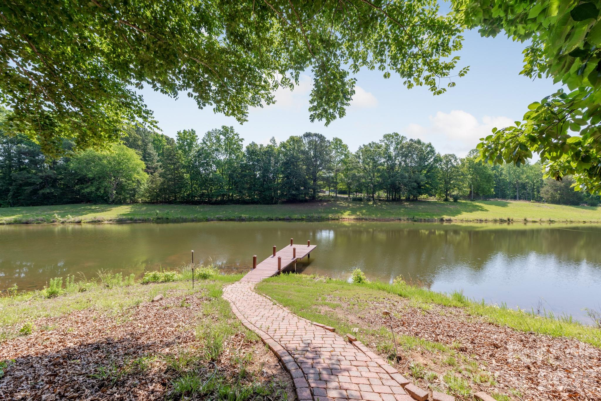 Enjoy sunset views on your own dock. - 4709 Rockwood Drive, Waxhaw