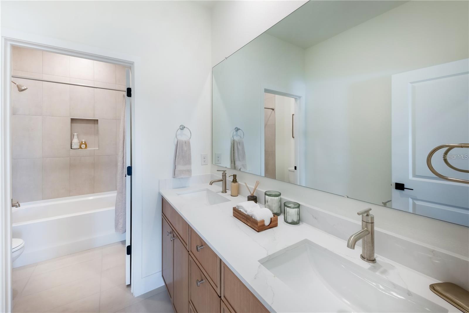 Photos are of same model with similiar finishes - 82 SPRINGWOOD DR, PALM COAST