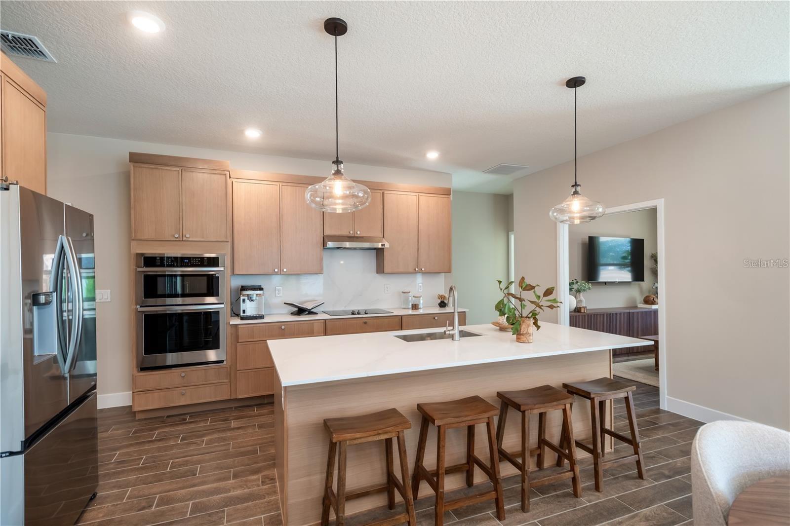 Photos are of same model with similiar finishes - 82 SPRINGWOOD DR, PALM COAST