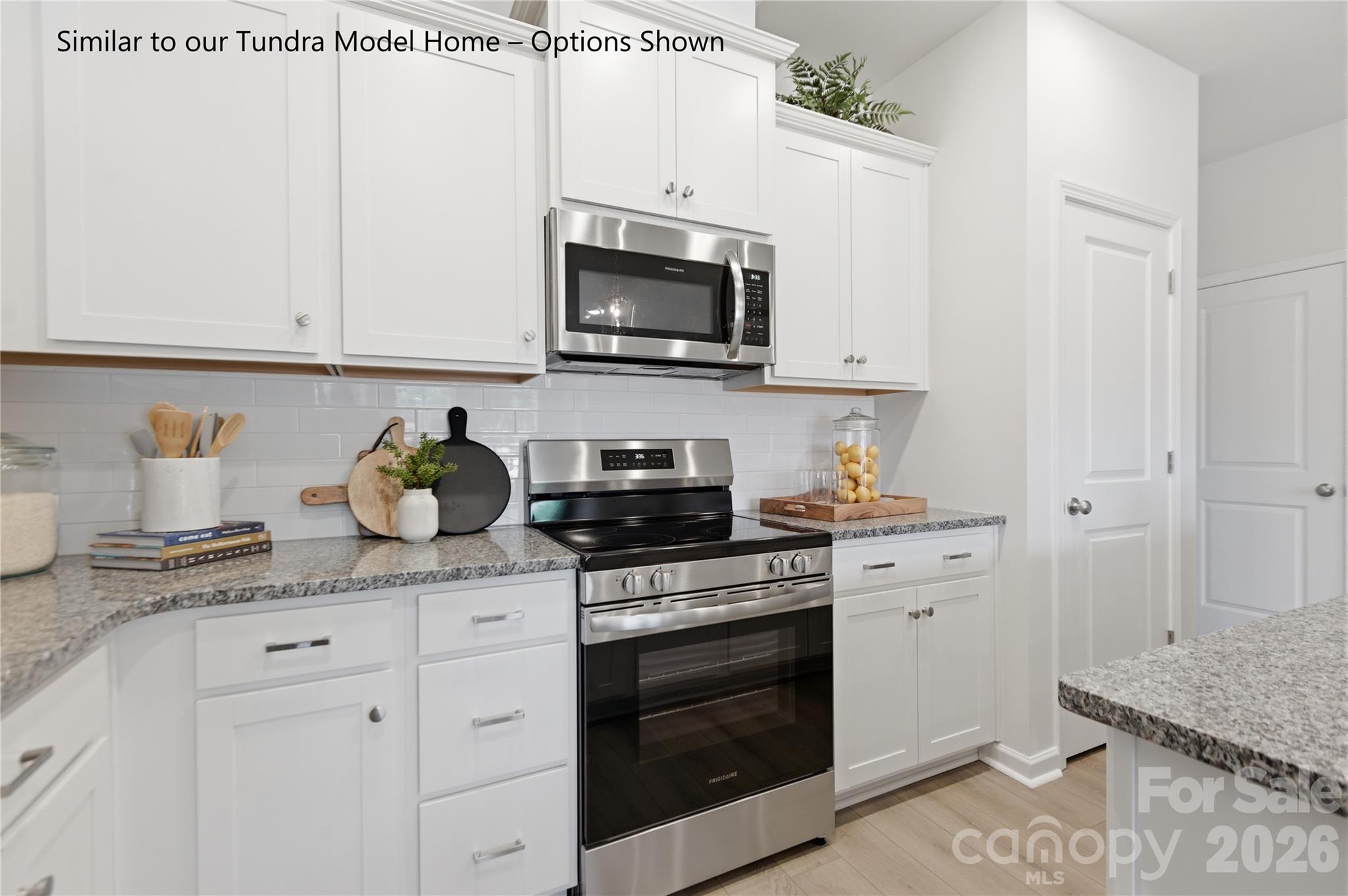 36" Cabinets with Crown Molding and Soft Close Doors, Offering Plenty of Storage Space - 6063 White Aster Lane, Charlotte