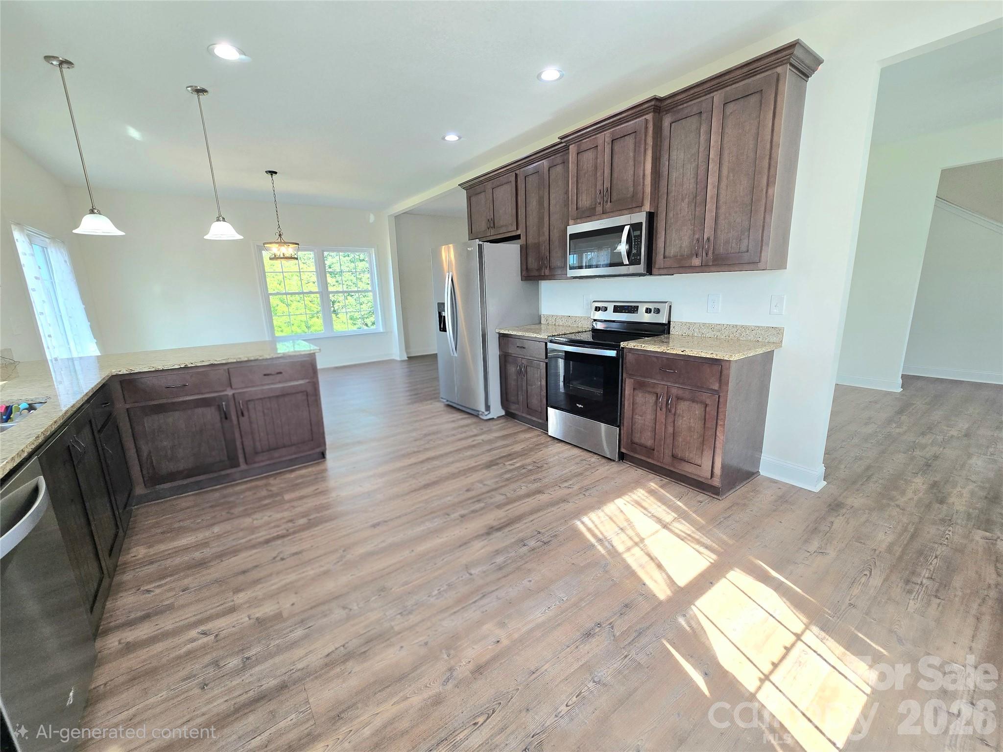 Kitchen to nook behind open to living, formal dining or den to right - 37 Justice Drive, Leicester
