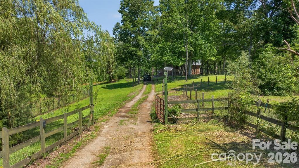 Drive in. This property offers a perfect blend of privacy and accessibility. - 00 Misery Ridge Trail, Mill Spring