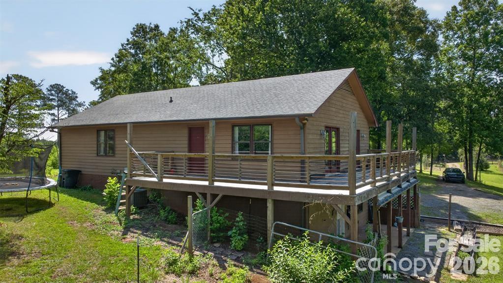 Rear view showing wraparound deck. - 00 Misery Ridge Trail, Mill Spring