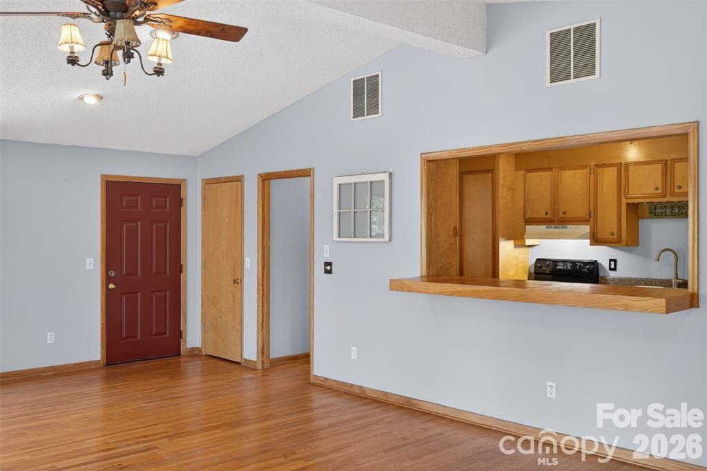 Except for kitchen & bathroom, all floors on the main level are hardwood. - 00 Misery Ridge Trail, Mill Spring
