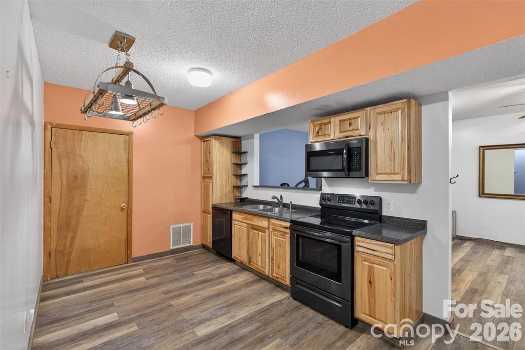 Apartment has LVP floors in all but one room. - 00 Misery Ridge Trail, Mill Spring