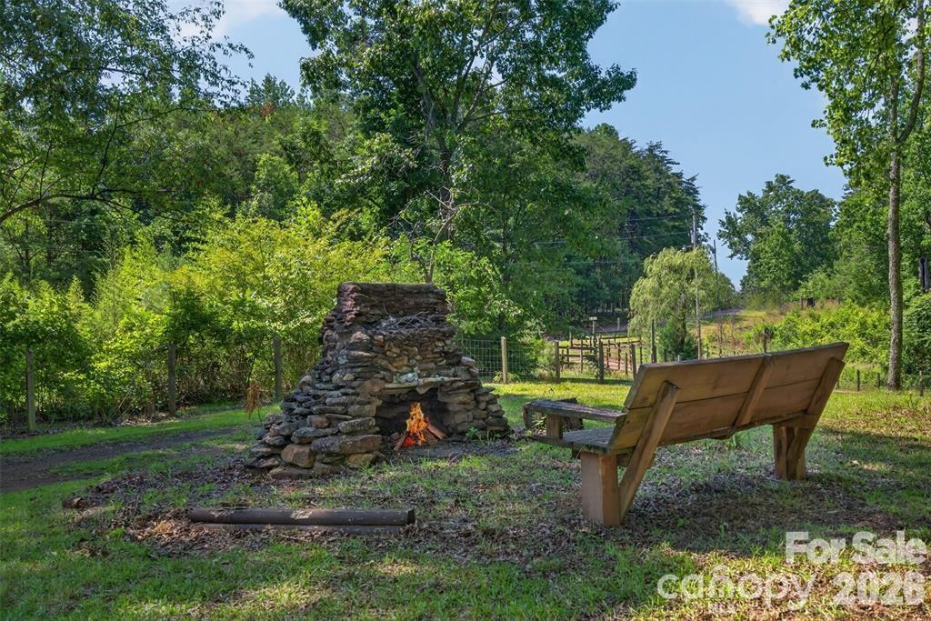 Outdoor fireplace. - 00 Misery Ridge Trail, Mill Spring
