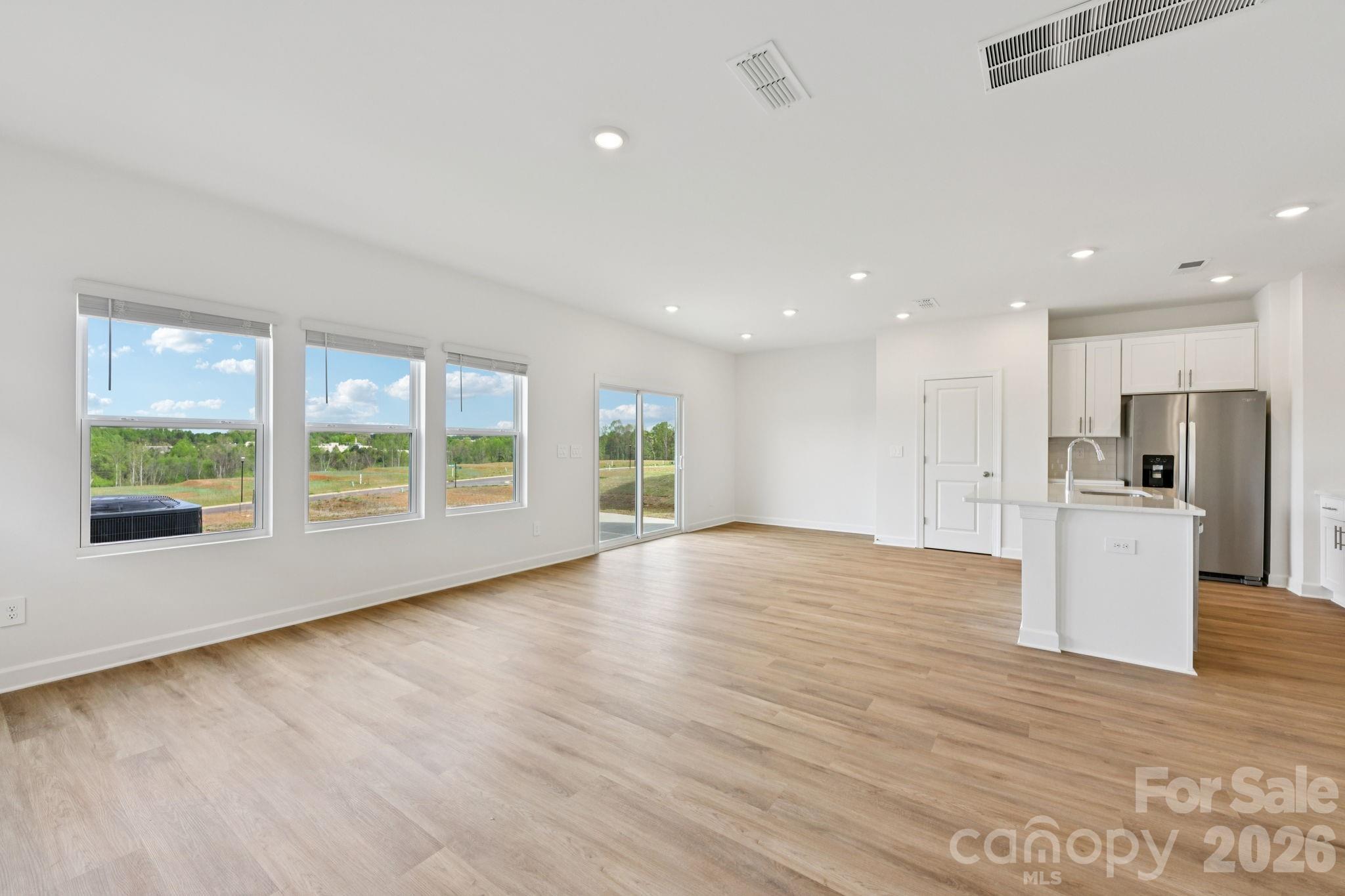 Photo is not of the actual home, but is an inspirational photo of builder’s model home and may depict options, furnishings, and/or decorator features that are not included - 1445 Wildflower Street, Newton
