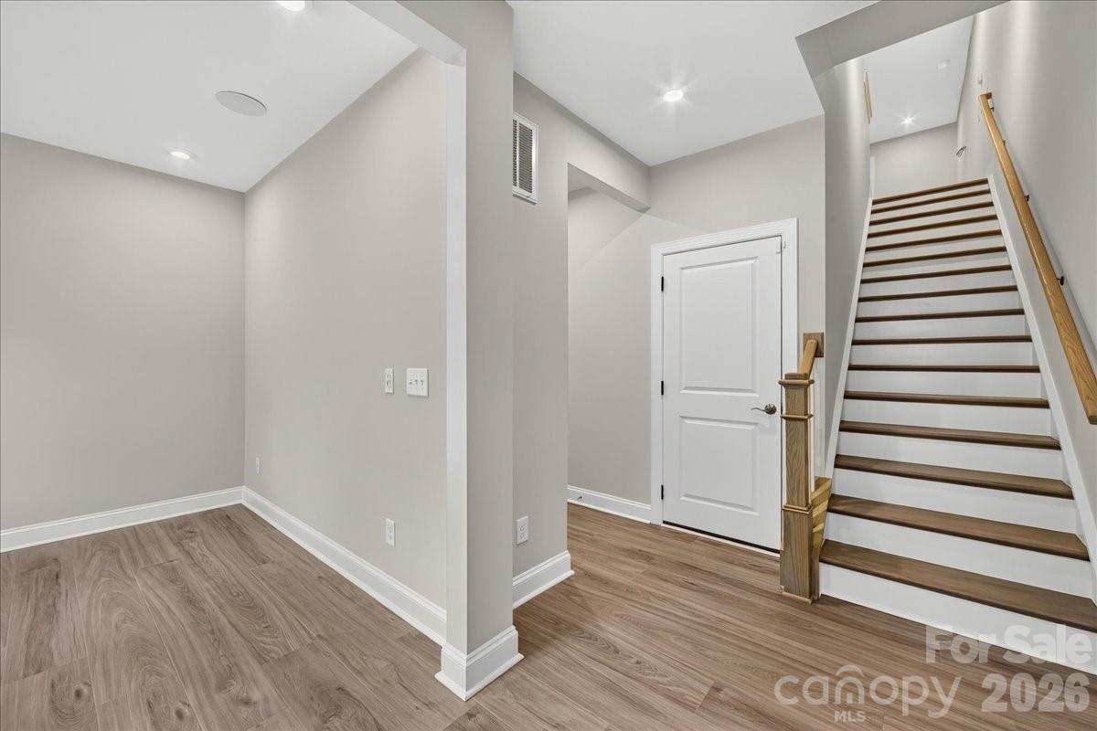 Oak box stairs with open rails - 232 Old Town Village Road, Waxhaw
