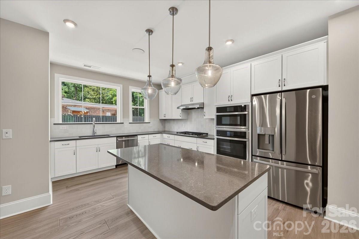Gourmet kitchen with appliances - 232 Old Town Village Road, Waxhaw