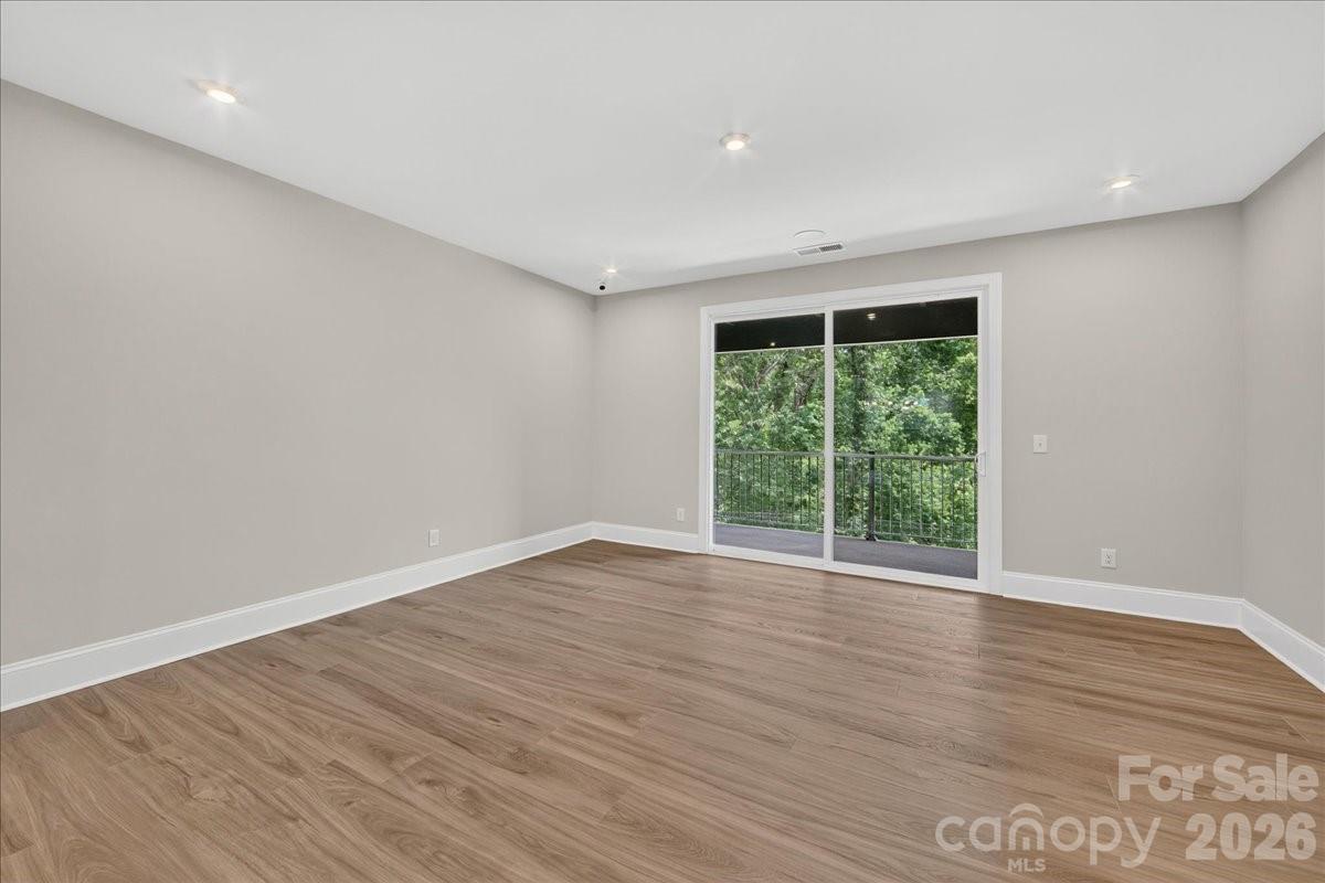 Living room with out door living access - 232 Old Town Village Road, Waxhaw
