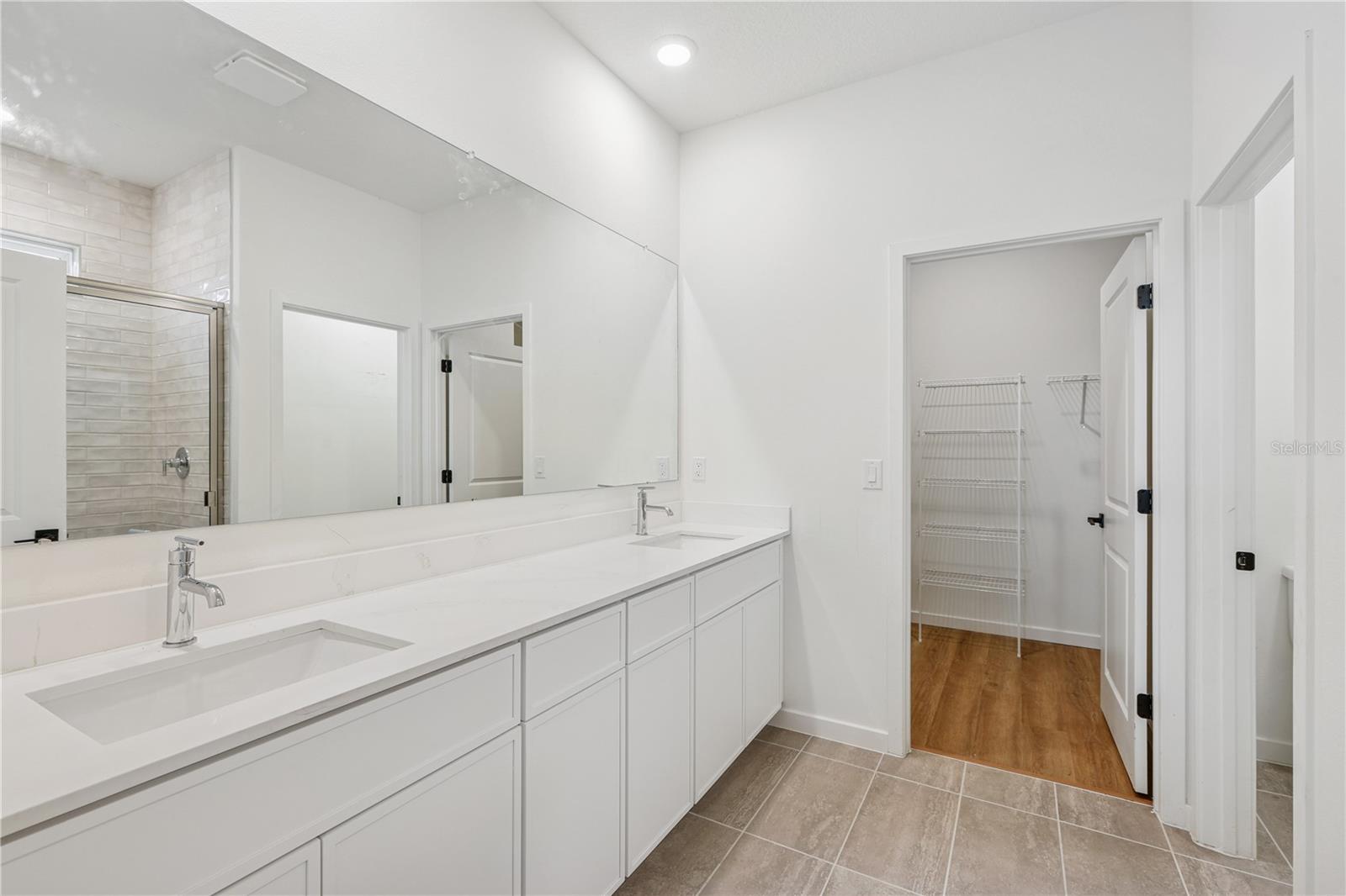 PHOTOS OF SAME MODEL WITH SIMILIAR FINISHES - 86 SPRINGWOOD DR, PALM COAST