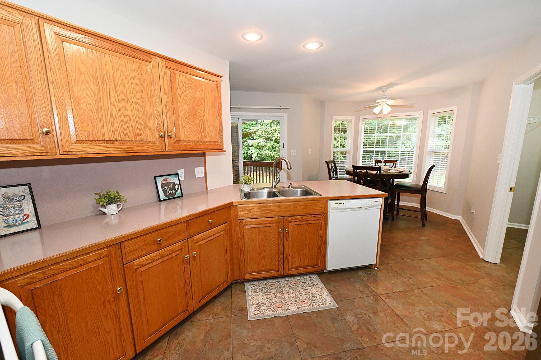 To the right of the entrance is the kitchen - 1035 E 24th Street, Newton
