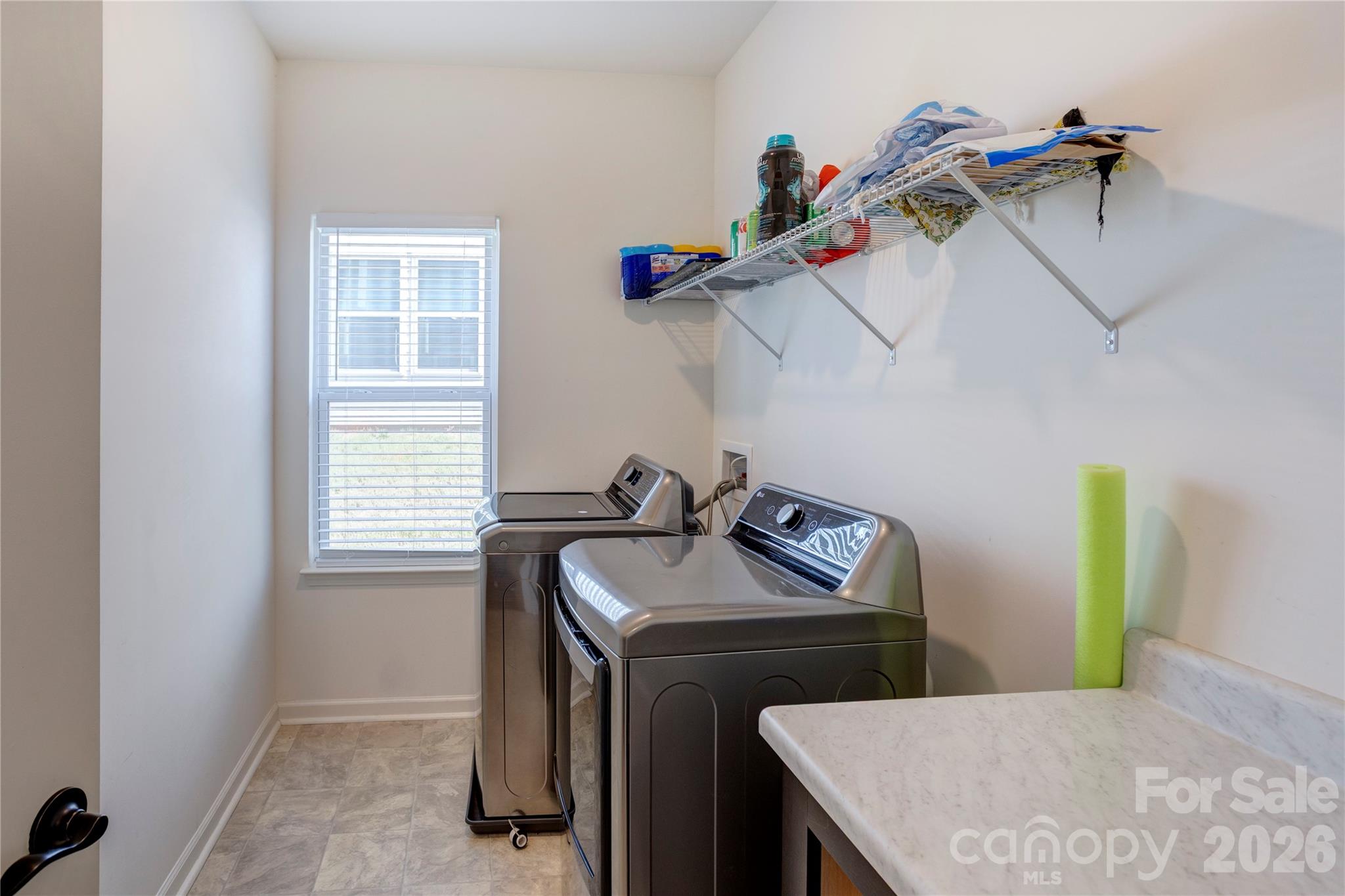 Laundry room on main floor - 6319 Clarisse Drive SW, Concord