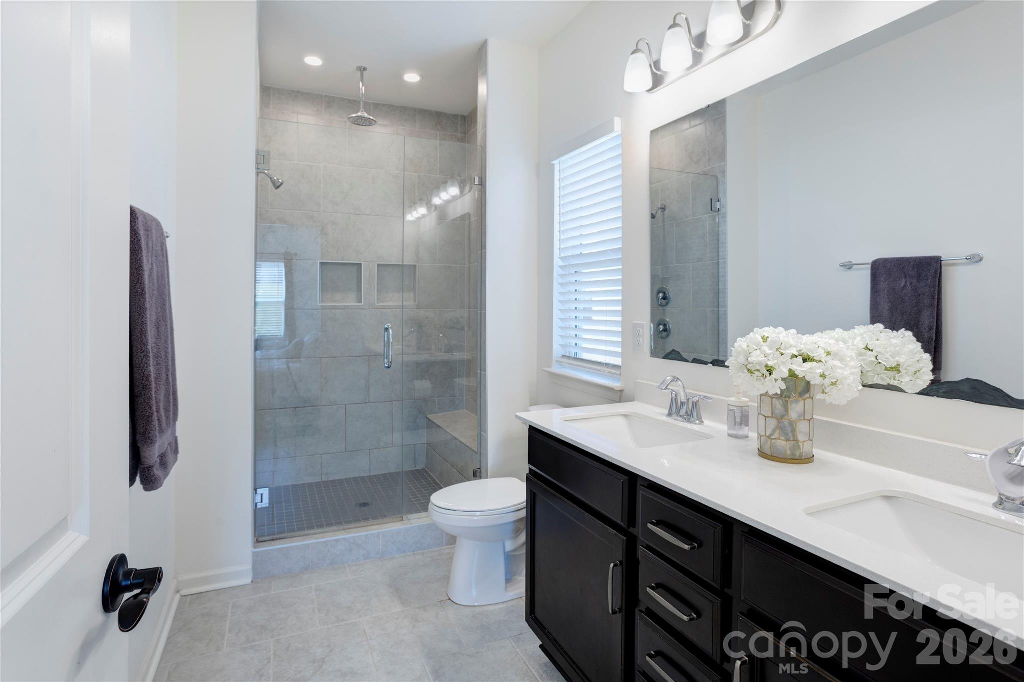 Primary bath on first floor - 6319 Clarisse Drive SW, Concord