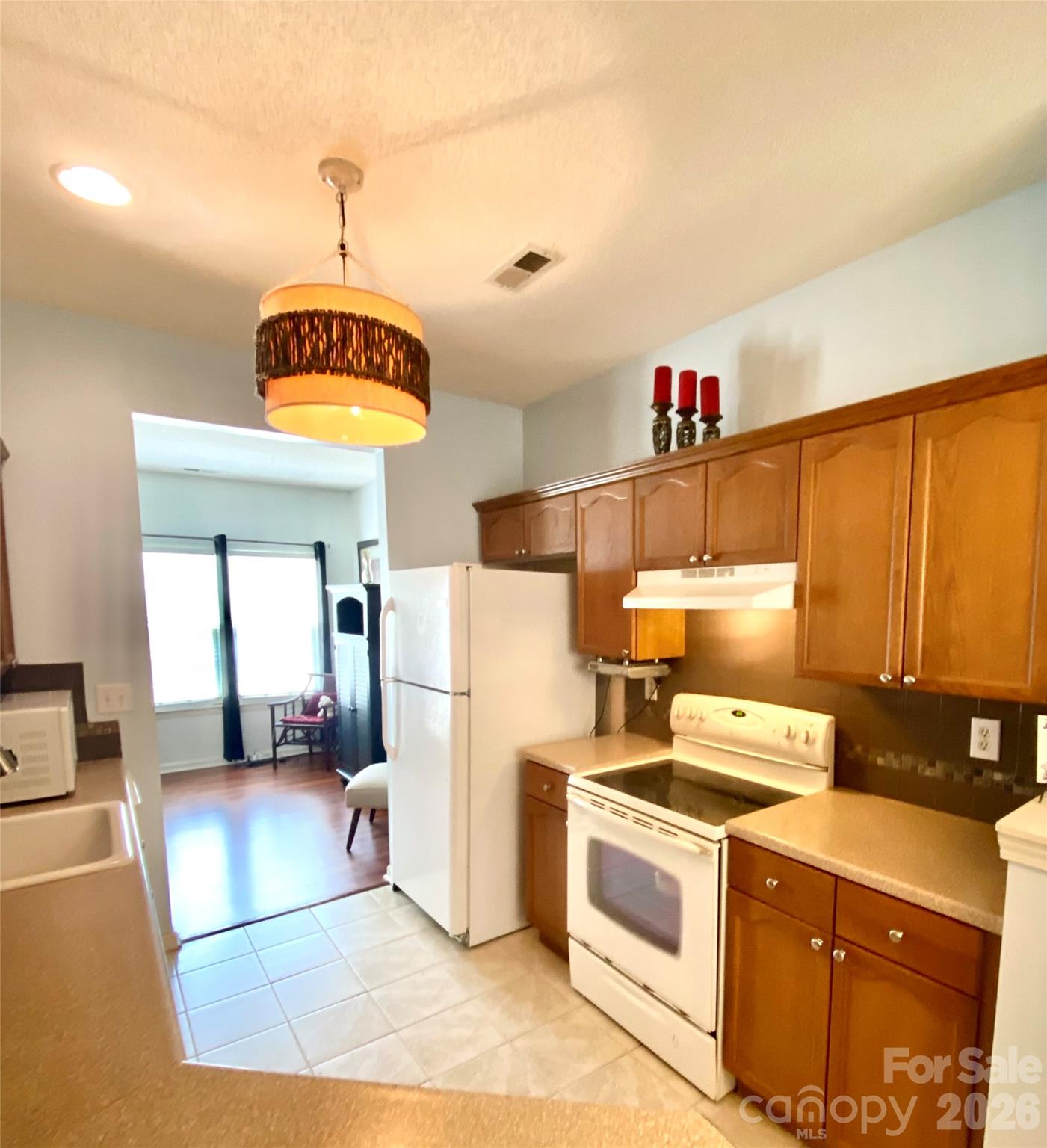 Kitchen with all appliances included. View is into the Living Room. - 6025 Creft Circle, Indian Trail
