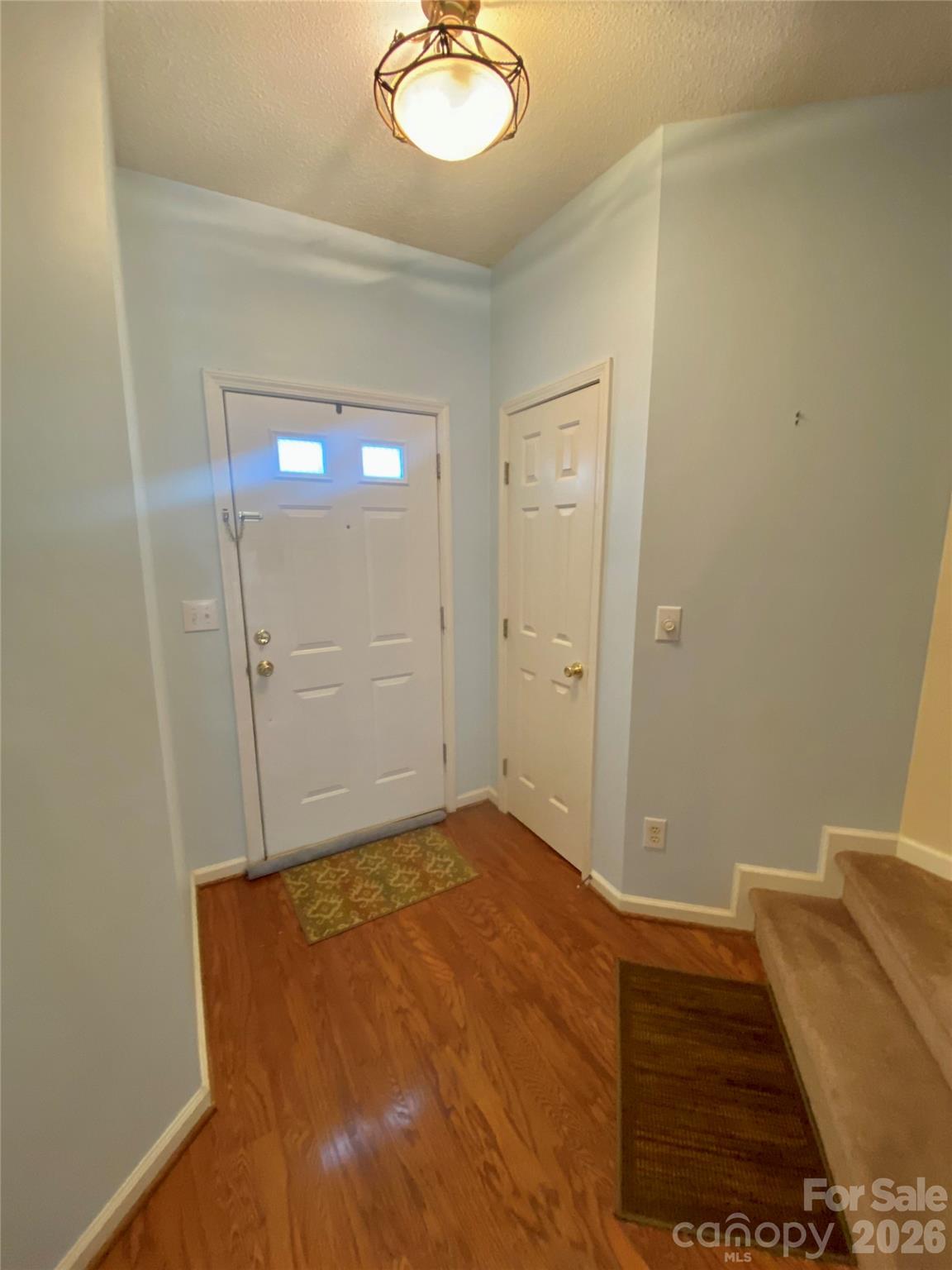 Front door entry area with coat closet. - 6025 Creft Circle, Indian Trail