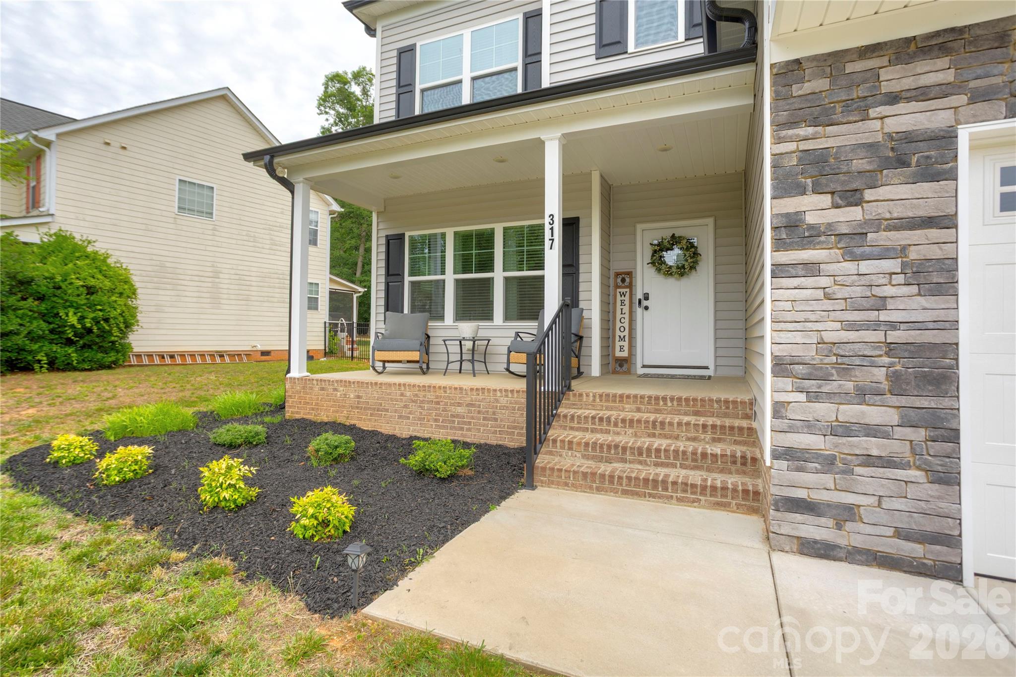 Peaceful front porch to greet your guests. - 317 Oak Brook Drive, Salisbury