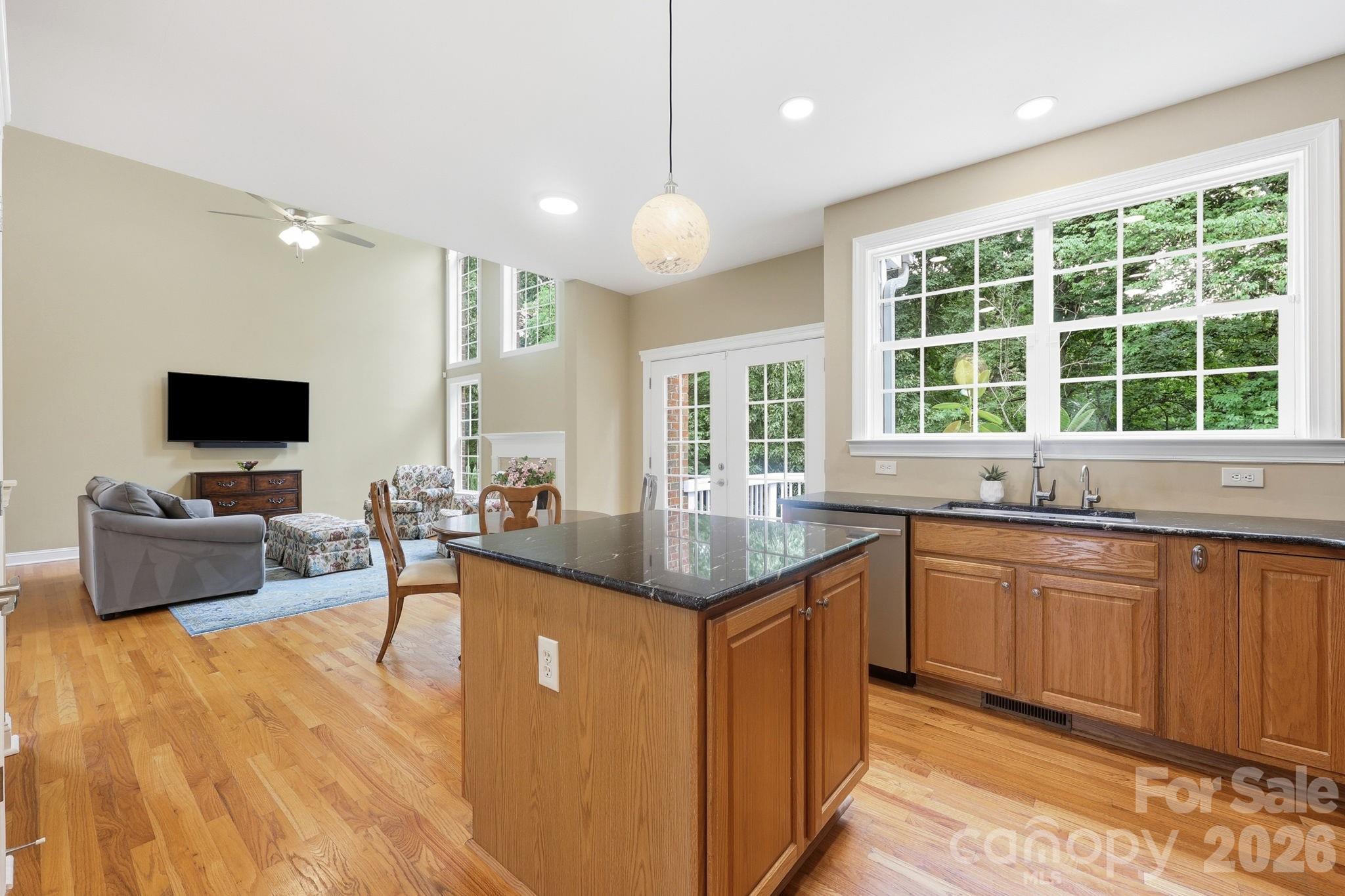 Open floor plan - view from kitchen into family room - 9329 Uxbridge Lane, Huntersville