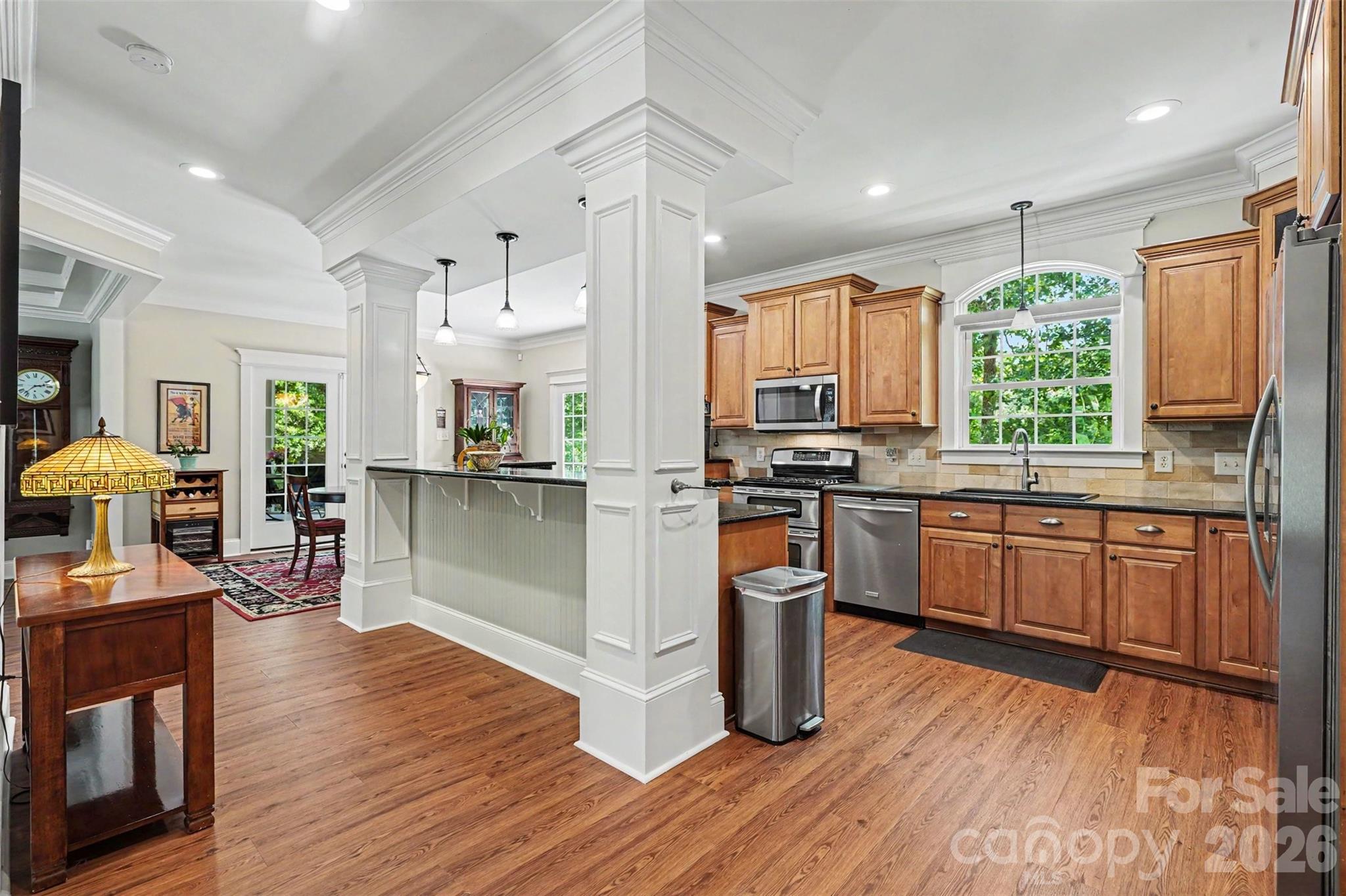 Kitchen with a bar top island perfect for entertaining - 162 Twin Lakes Drive, Statesville