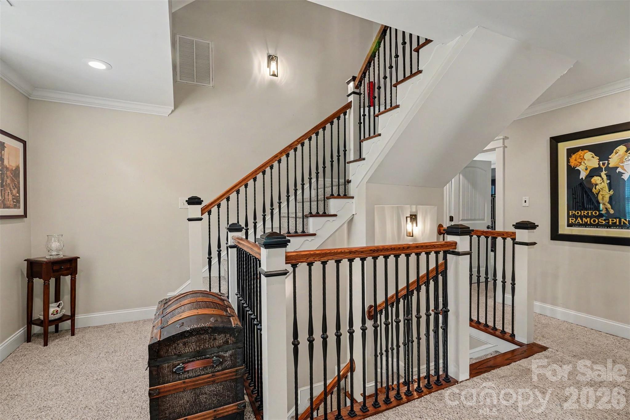 Wide stairwell landing makes each floor inviting - 162 Twin Lakes Drive, Statesville