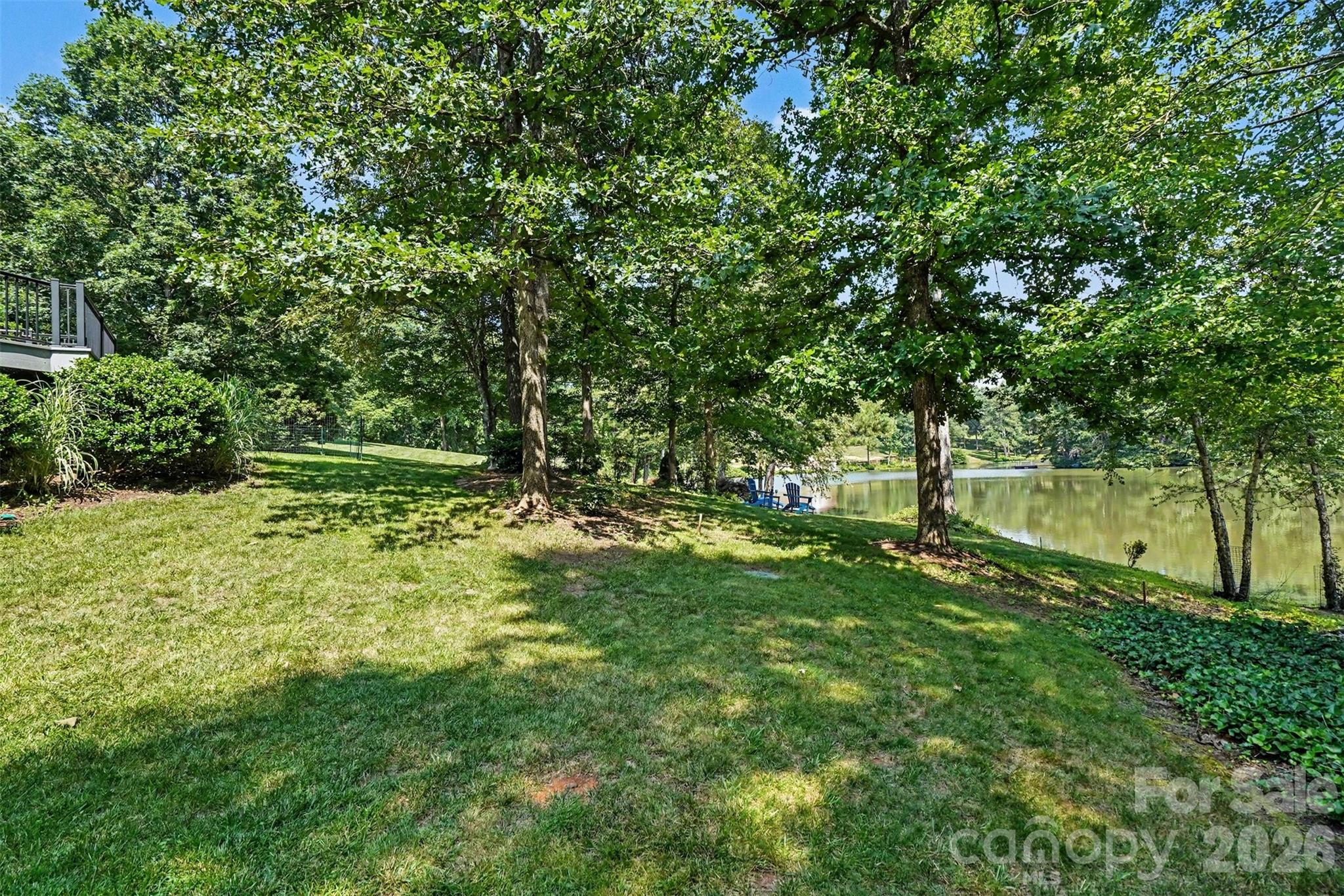 Backyard has a gentle slope - 162 Twin Lakes Drive, Statesville