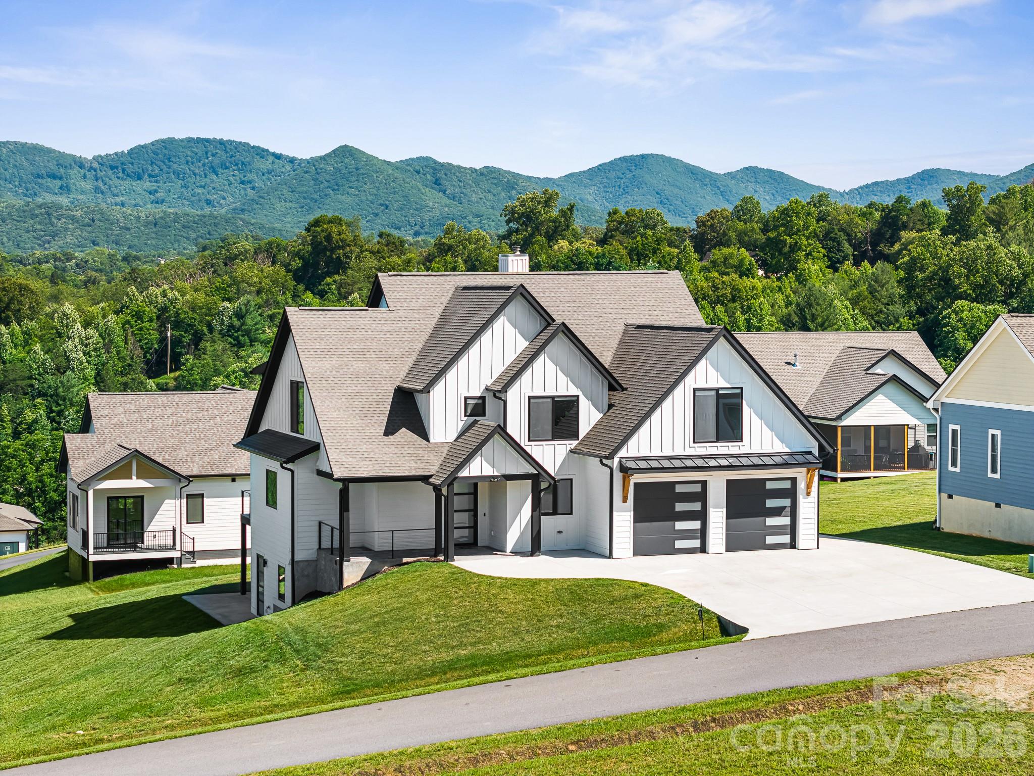 Single Family Residence at 1026 Hillside Ridge Road, Candler, photo 3 of 48