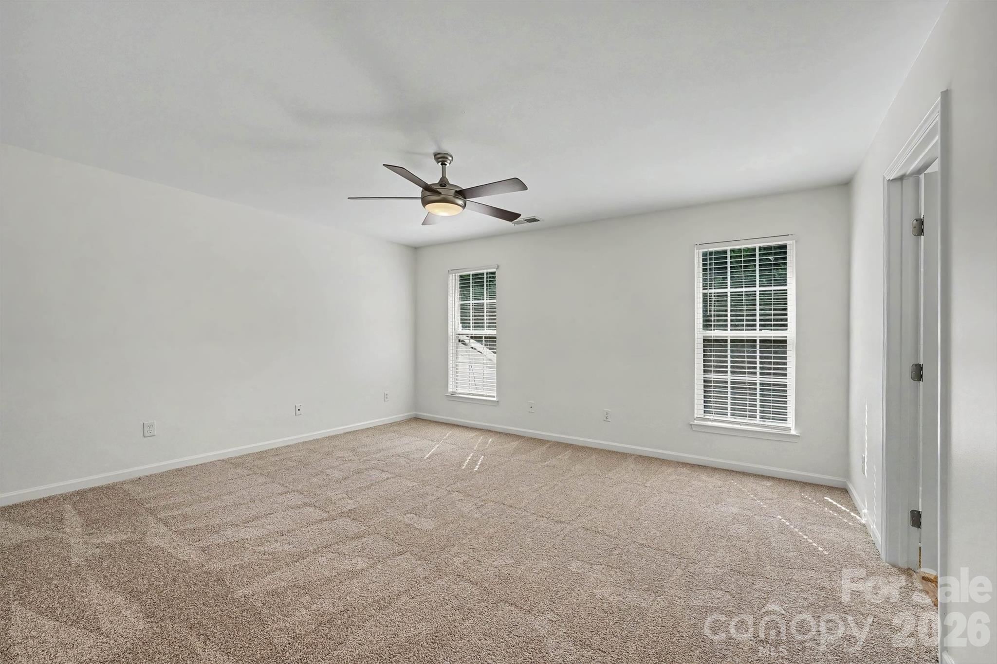 Primary bedroom.  Brand new carpet throughout the home! - 107 S Arcadian Way, Mooresville
