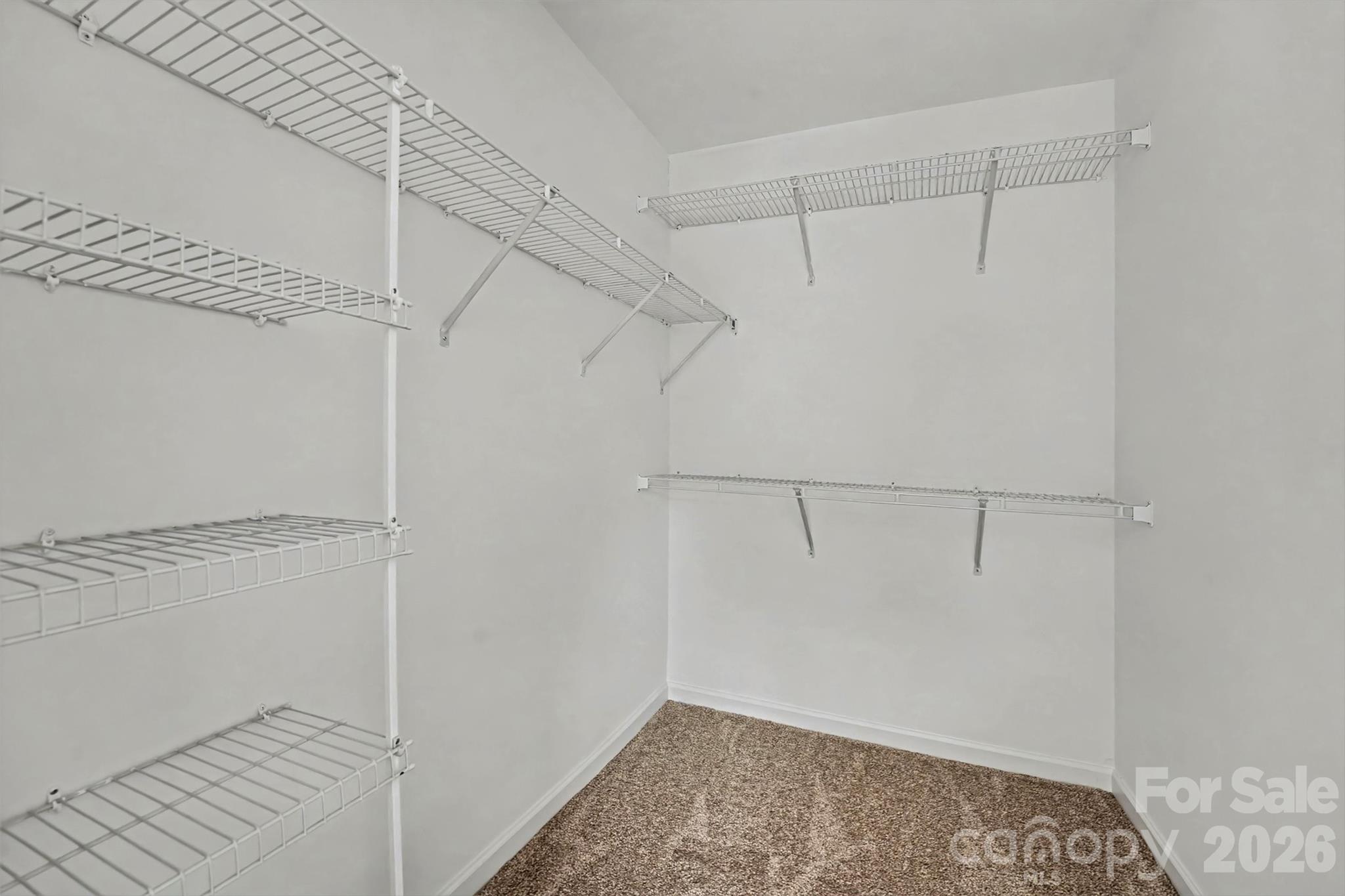 Large primary bedroom closet - 107 S Arcadian Way, Mooresville