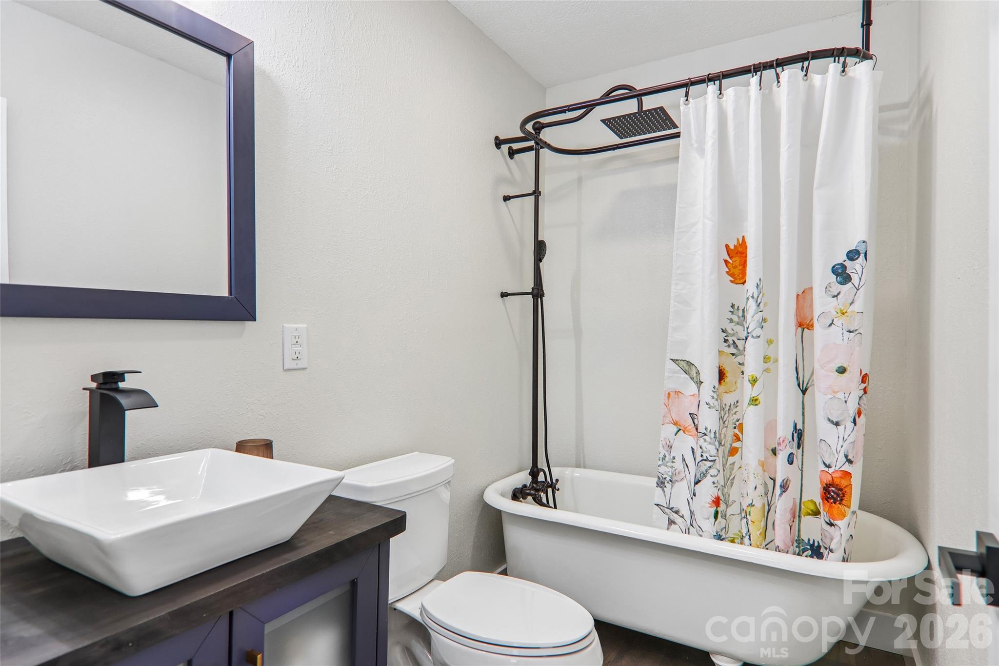 main bathroom with original clawfoot tub/shower - 169 East Street, Waynesville