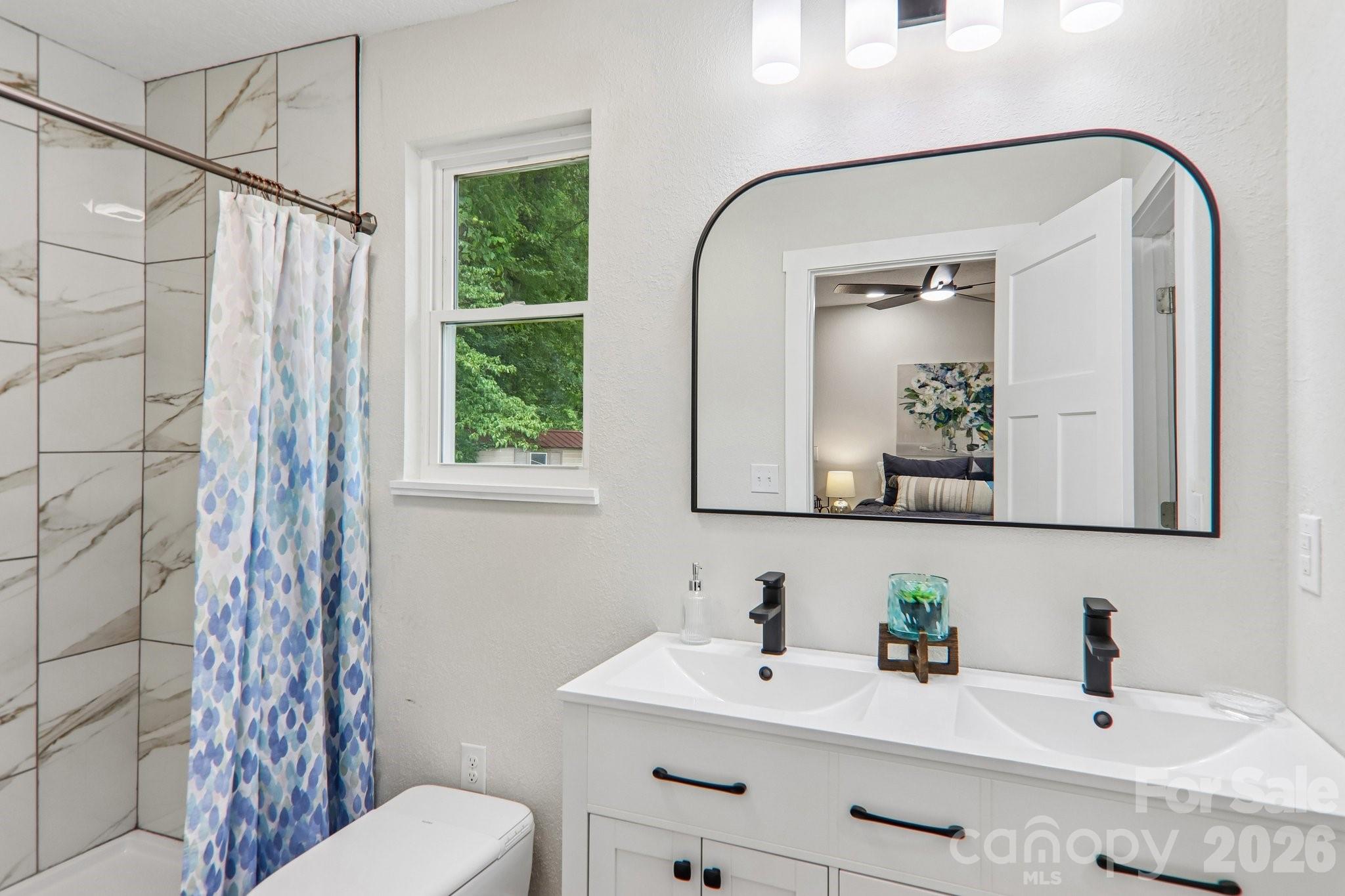 Primary w/ custom tile shower + upgraded toilet w/ bidet - 169 East Street, Waynesville