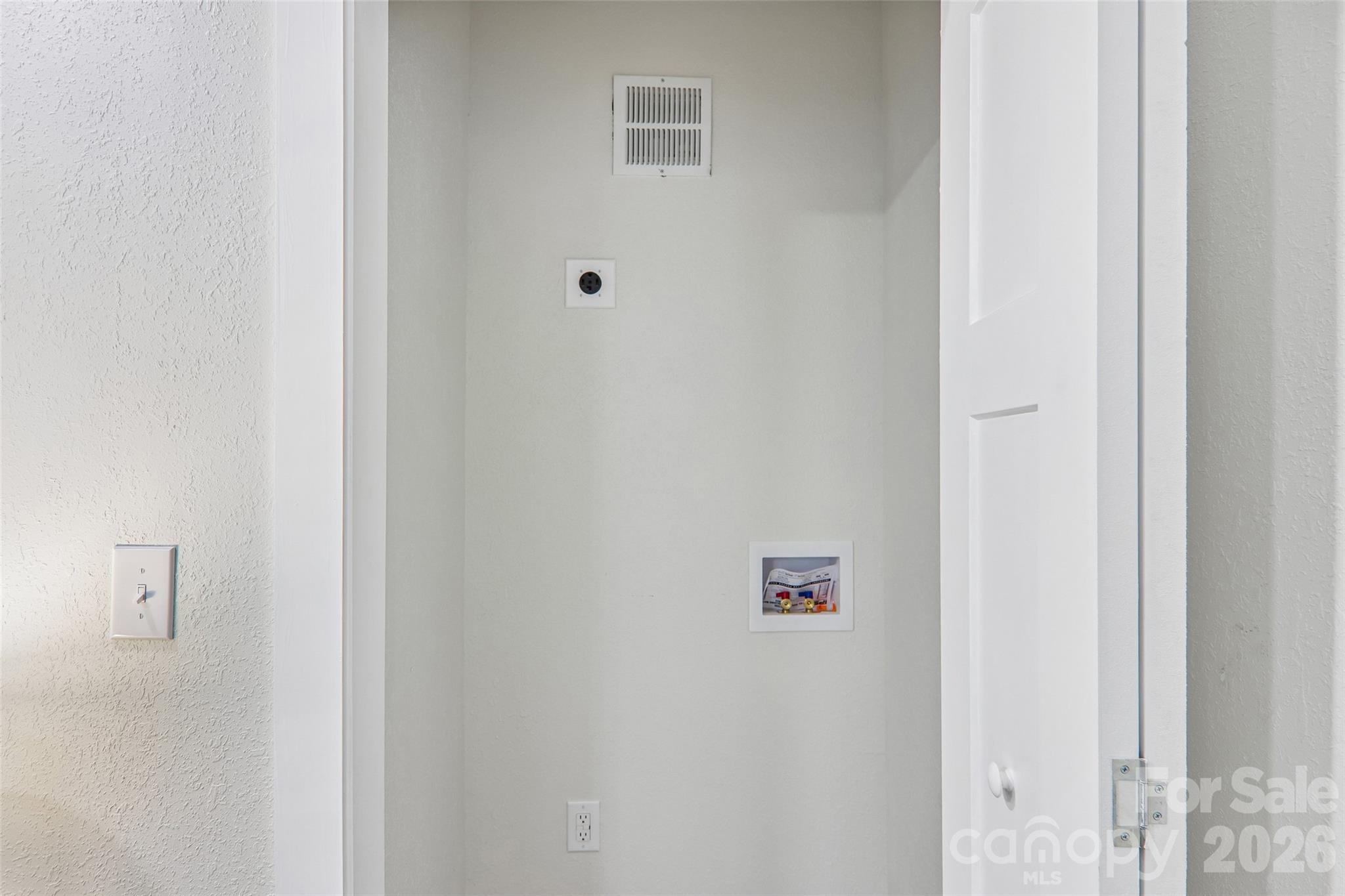 laundry closet in primary - 169 East Street, Waynesville