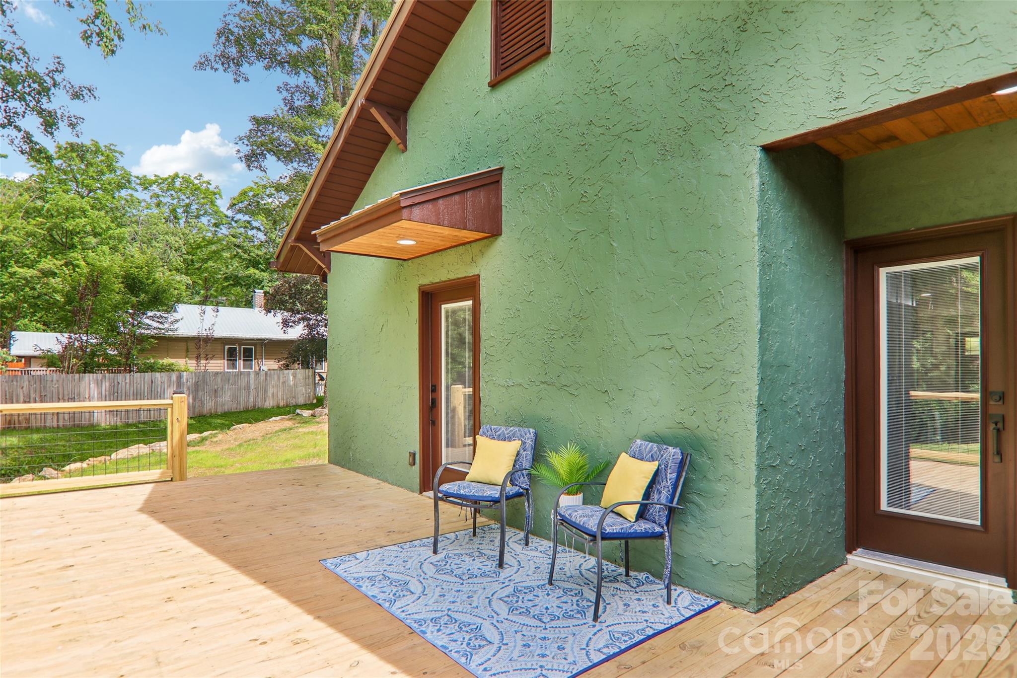 back deck access to primary & kitchen - 169 East Street, Waynesville