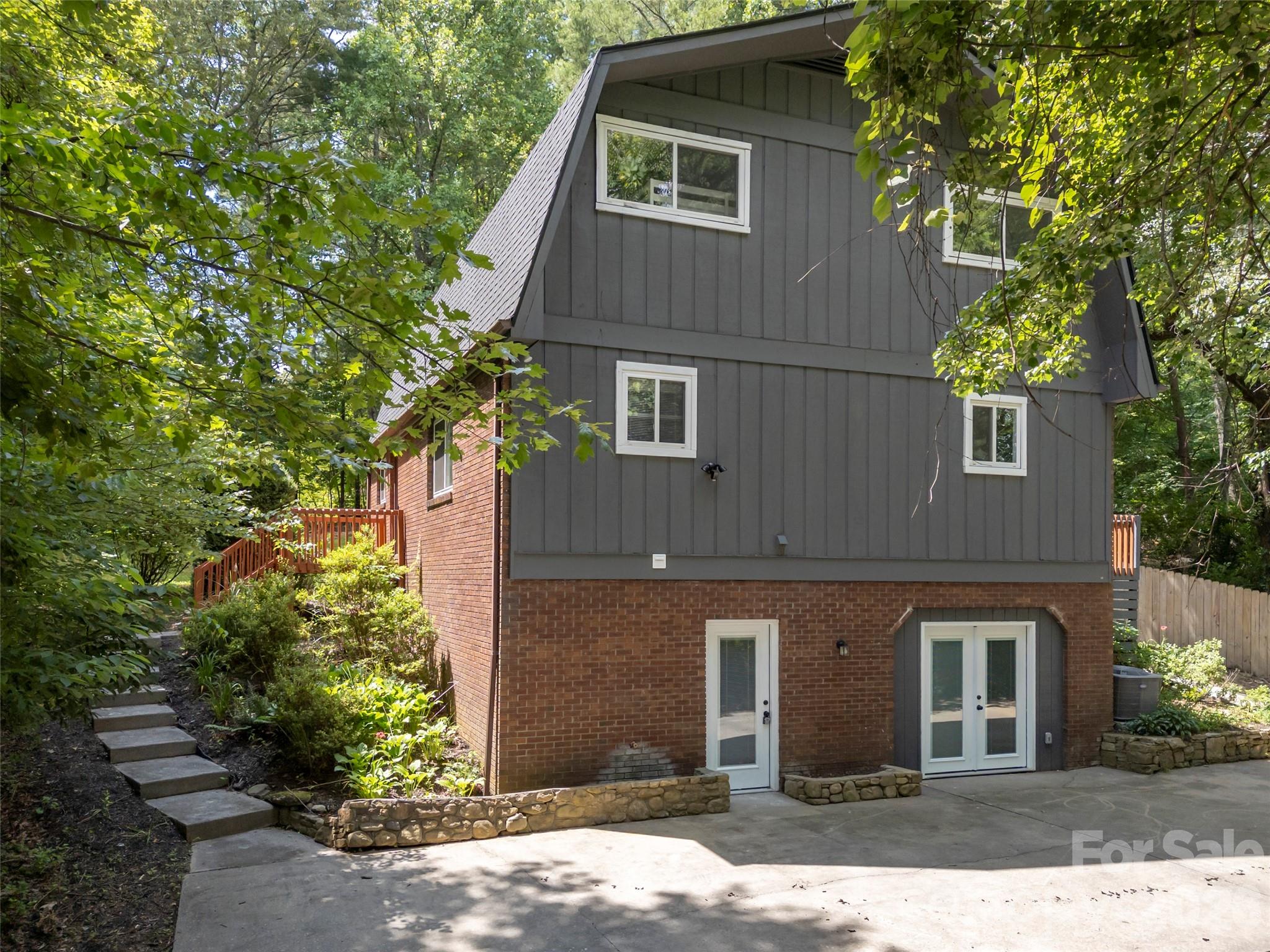 Entry from parking to lower level. - 3276 Howard Gap Road, Hendersonville