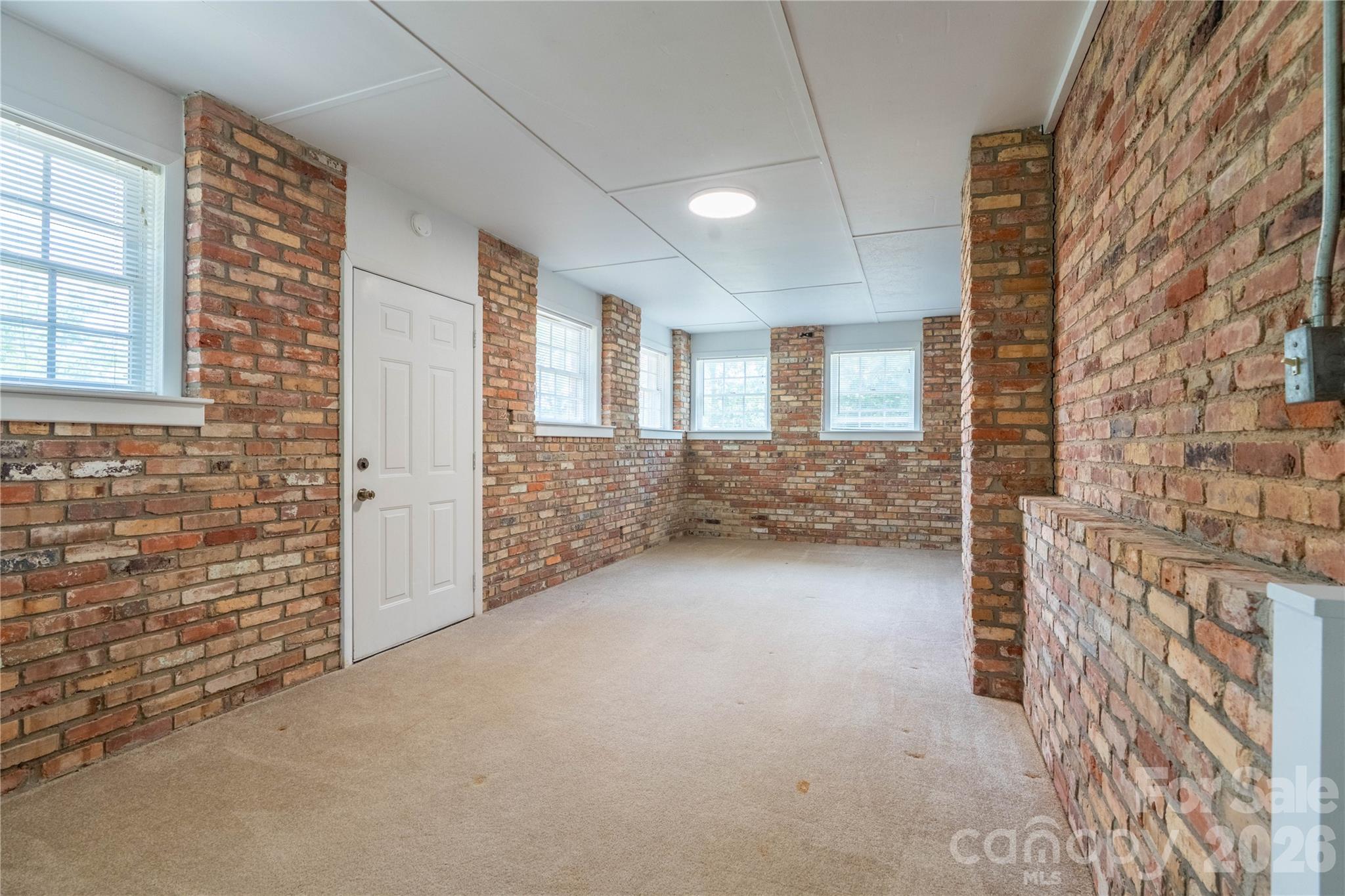 Bonus room with lots of light , it does not have a heat source and was not counted in heated sq. footage - 45 Mountain View Avenue, Black Mountain