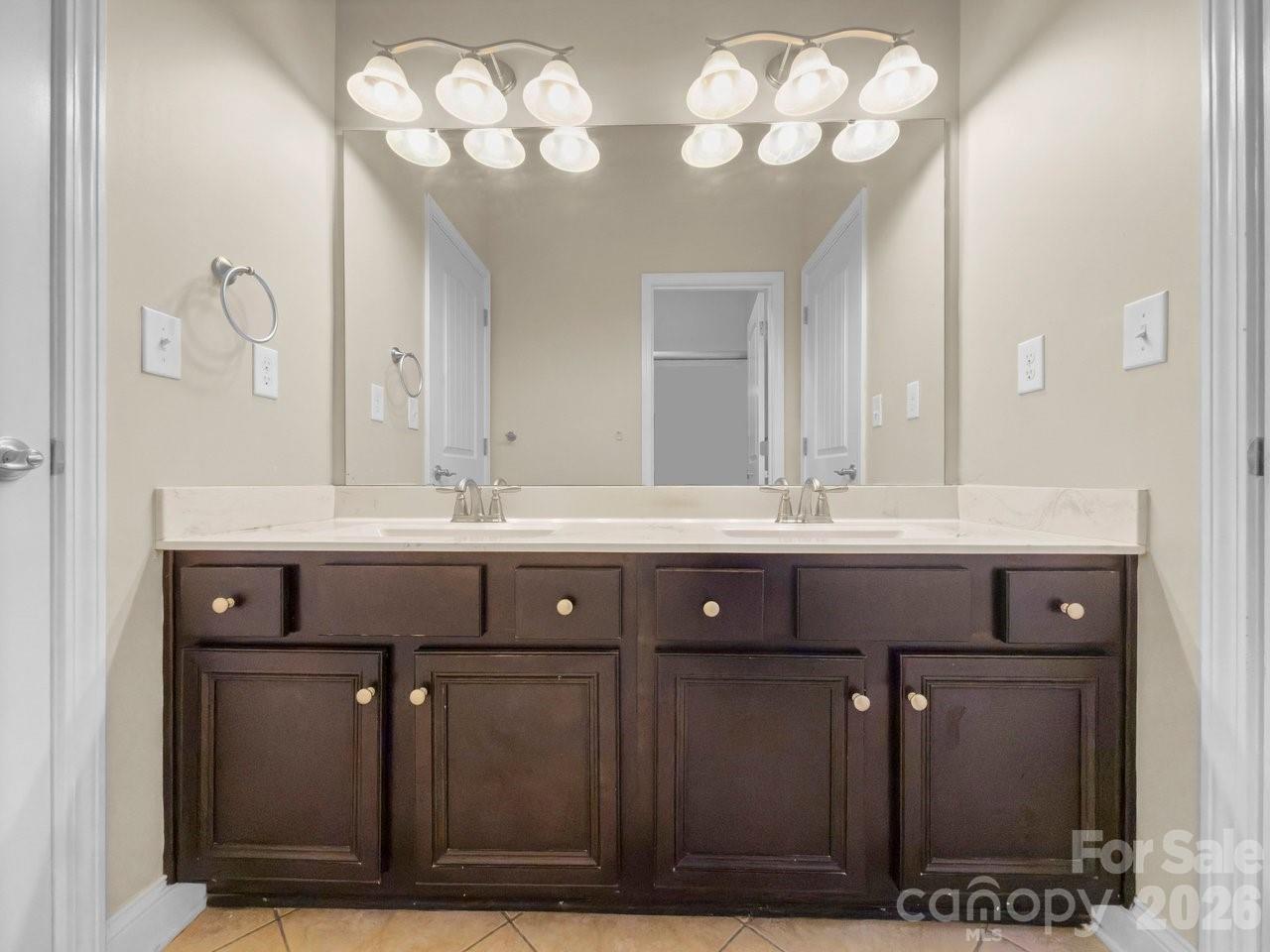Double Sink Vanity Joining Two Upper Level Bedrooms - 16032 Loch Raven Road, Huntersville
