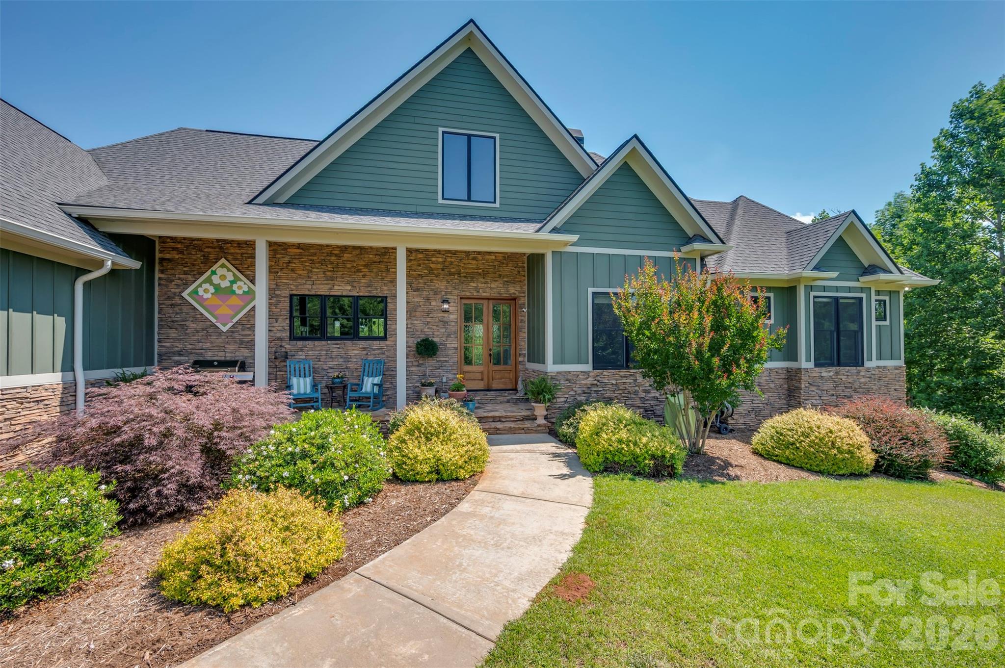 porches and decks all around the home invite you to sit and relax - 398 Mapleton Lane, Columbus