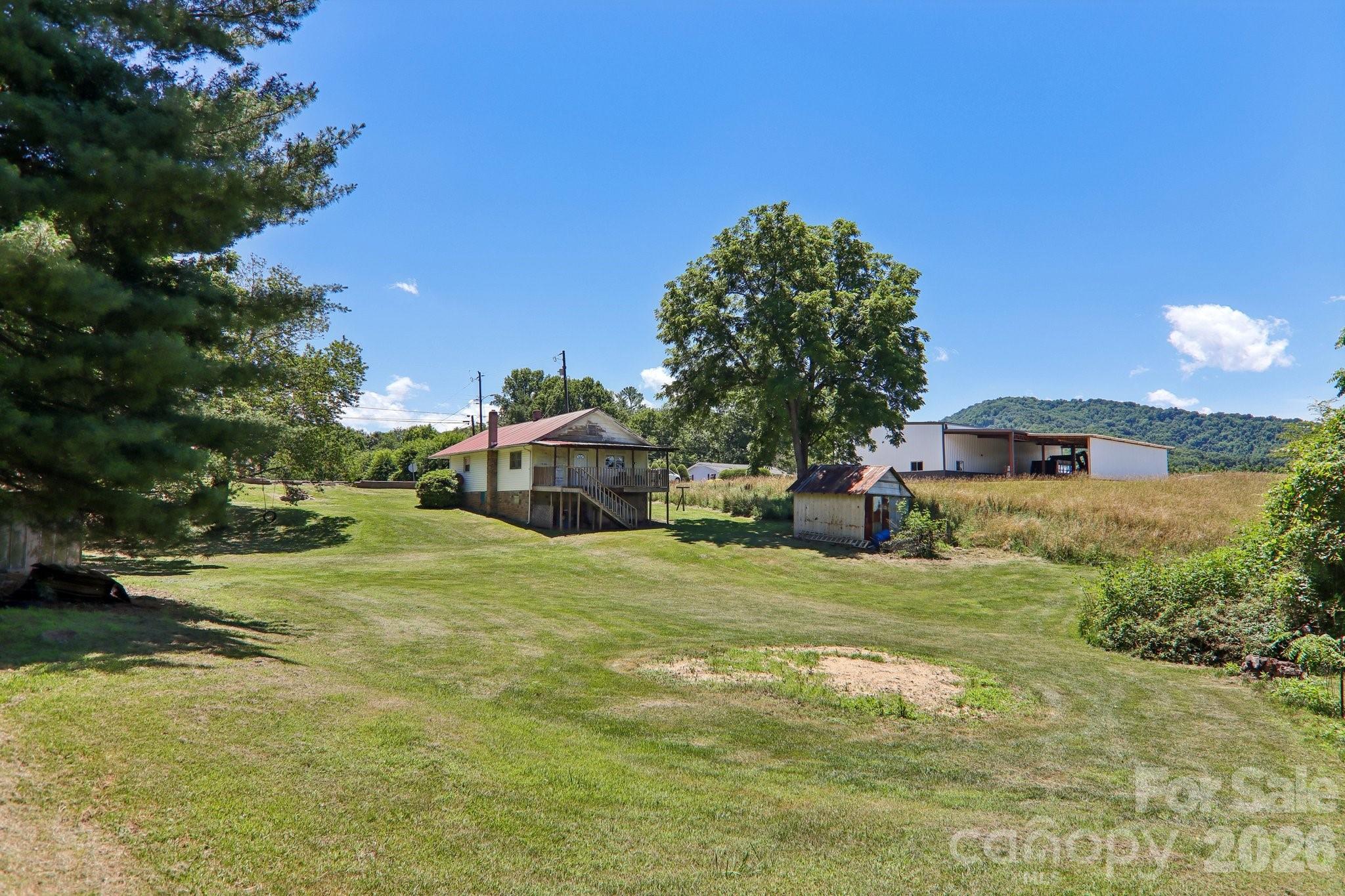 Lot is .43 acres. Garden space, blackberries. Use the land or divide off extra lot which is allowed per town of Canton zoning - 414 Skyline Drive, Canton