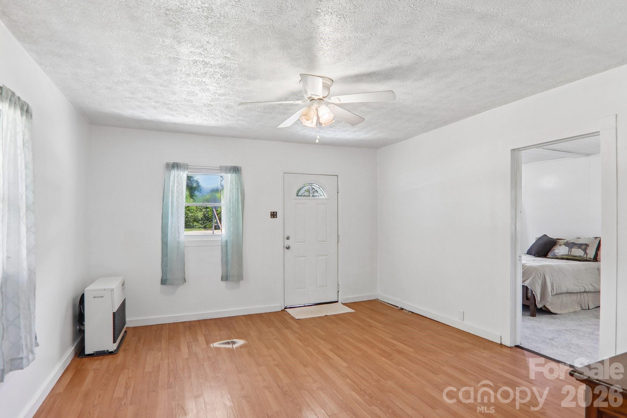 Living room with monitor heater - 414 Skyline Drive, Canton