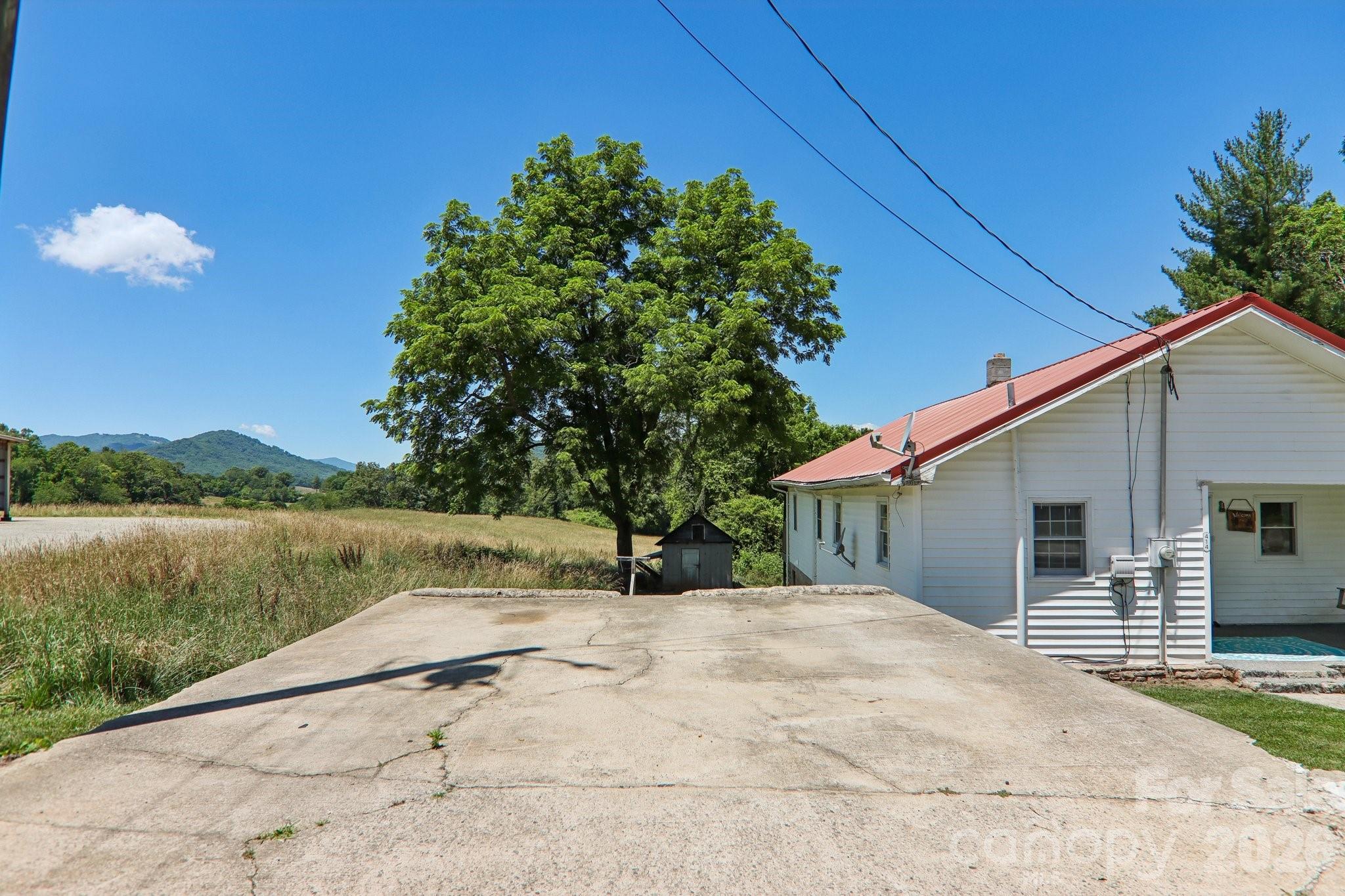 Parking pad to left of house - 414 Skyline Drive, Canton
