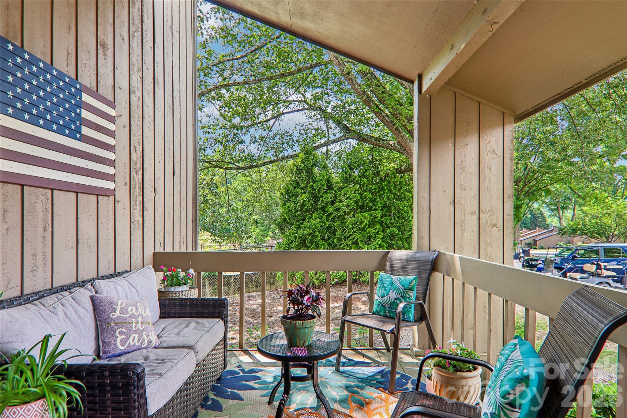 extra large front porch - 147 W Lake Drive S, Lake Lure