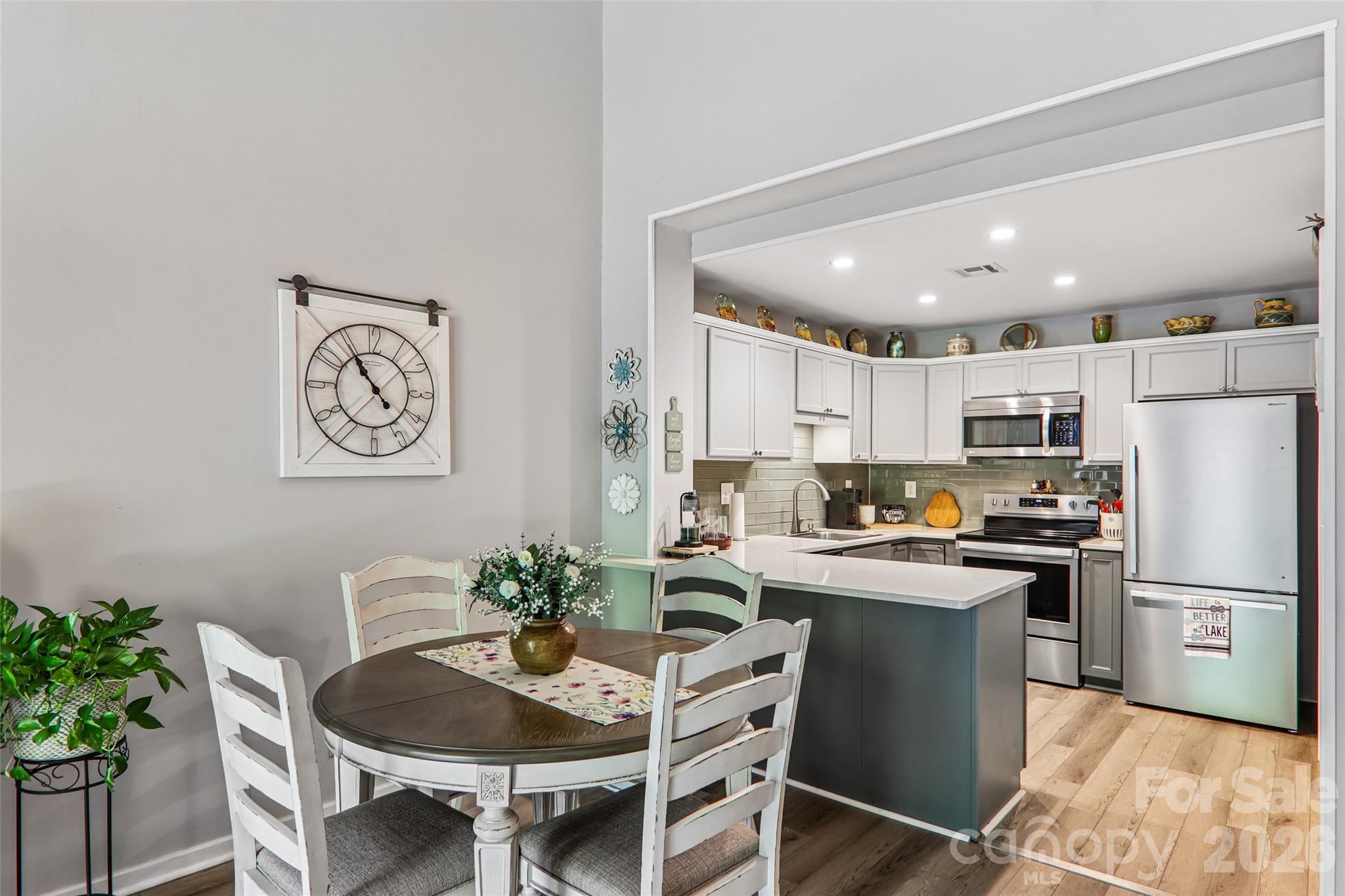 Remodeled kitchen with stainless steel appliances - 147 W Lake Drive S, Lake Lure