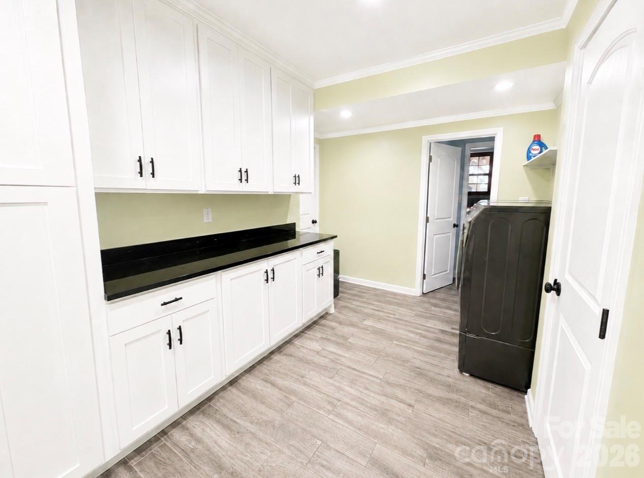 Laundry room in basement - 469 Augusta Drive, Statesville
