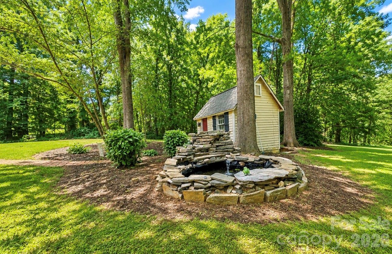 Fish pond water feature and garden shed - 469 Augusta Drive, Statesville