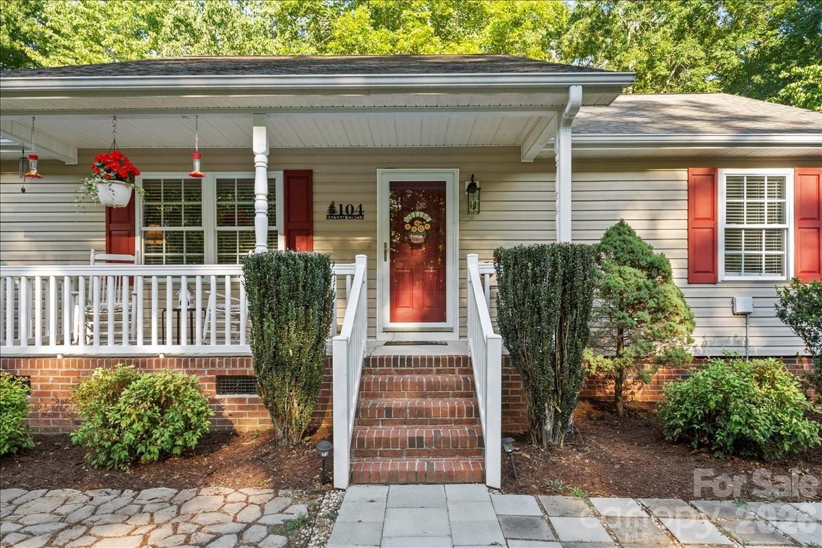 A front porch that is inviting to come home to or welcome family and friends. - 104 Balsam Circle, Troy