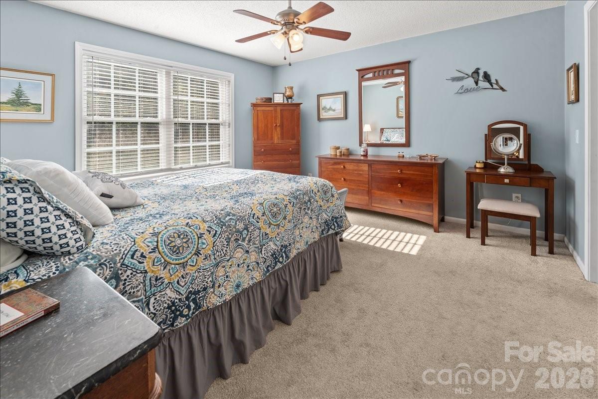 The primary bedroom is spacious with a nice sized closet. - 104 Balsam Circle, Troy