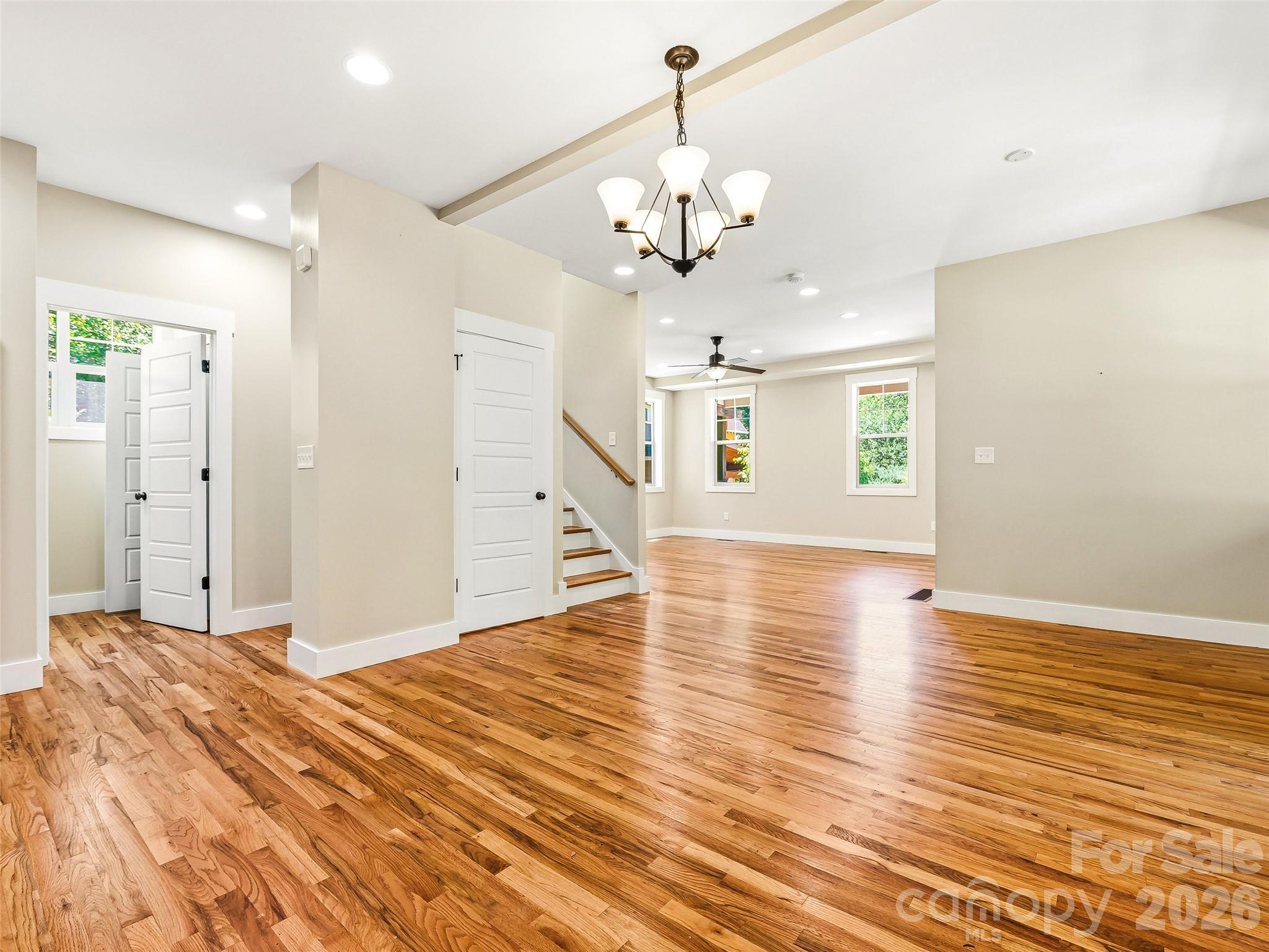 Seamless flow from kitchen to dinging area. - 25 Shady Park Lane, Asheville