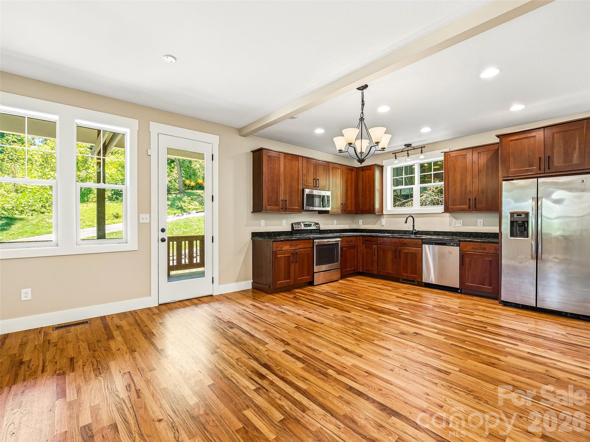 Dining area to kitchen. - 25 Shady Park Lane, Asheville