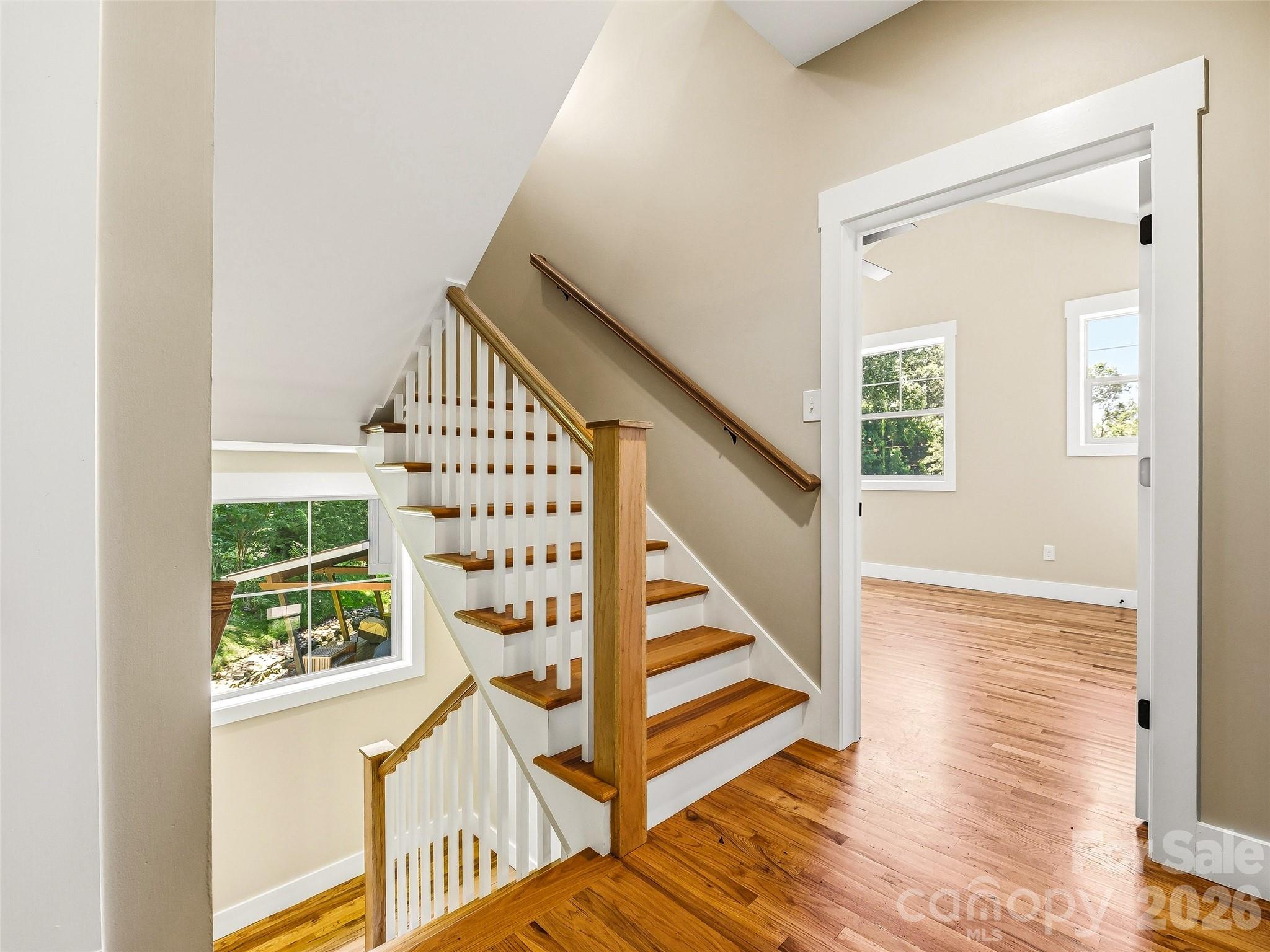 Stairwell to third level. - 25 Shady Park Lane, Asheville