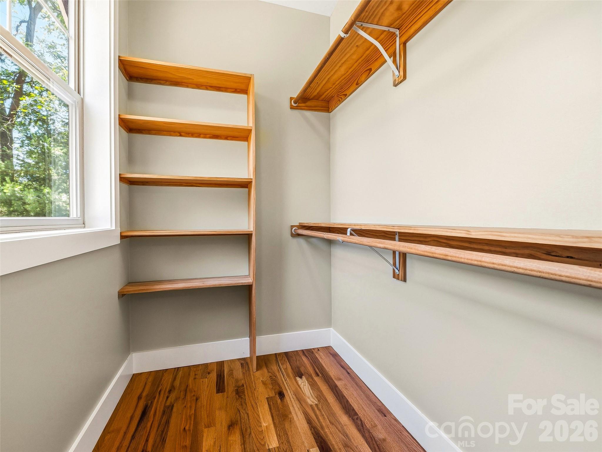 Primary walk-in closet. - 25 Shady Park Lane, Asheville